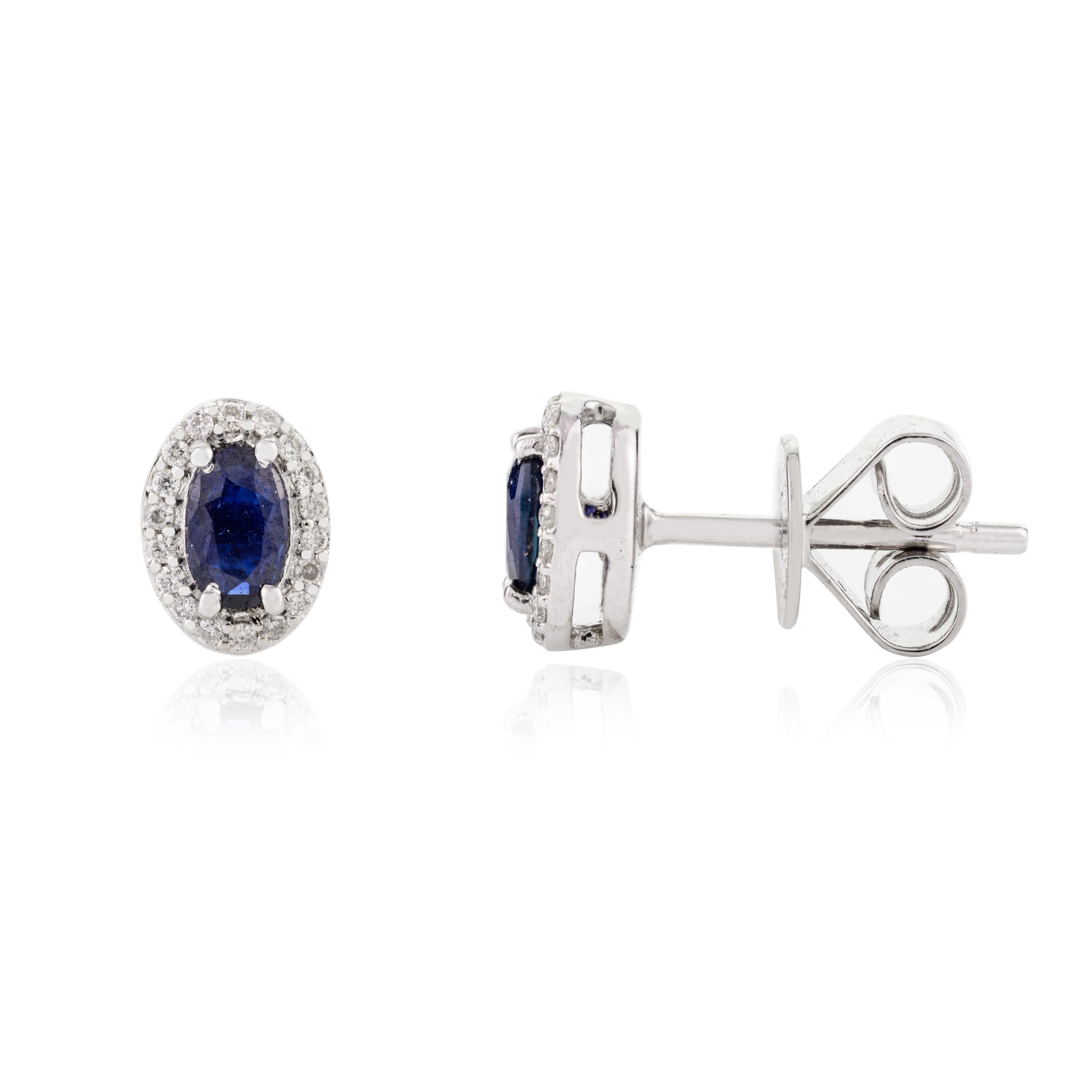 Dainty Blue Sapphire Stud Earrings with Diamond Around in 18k Solid White Gold In New Condition For Sale In New York, NY