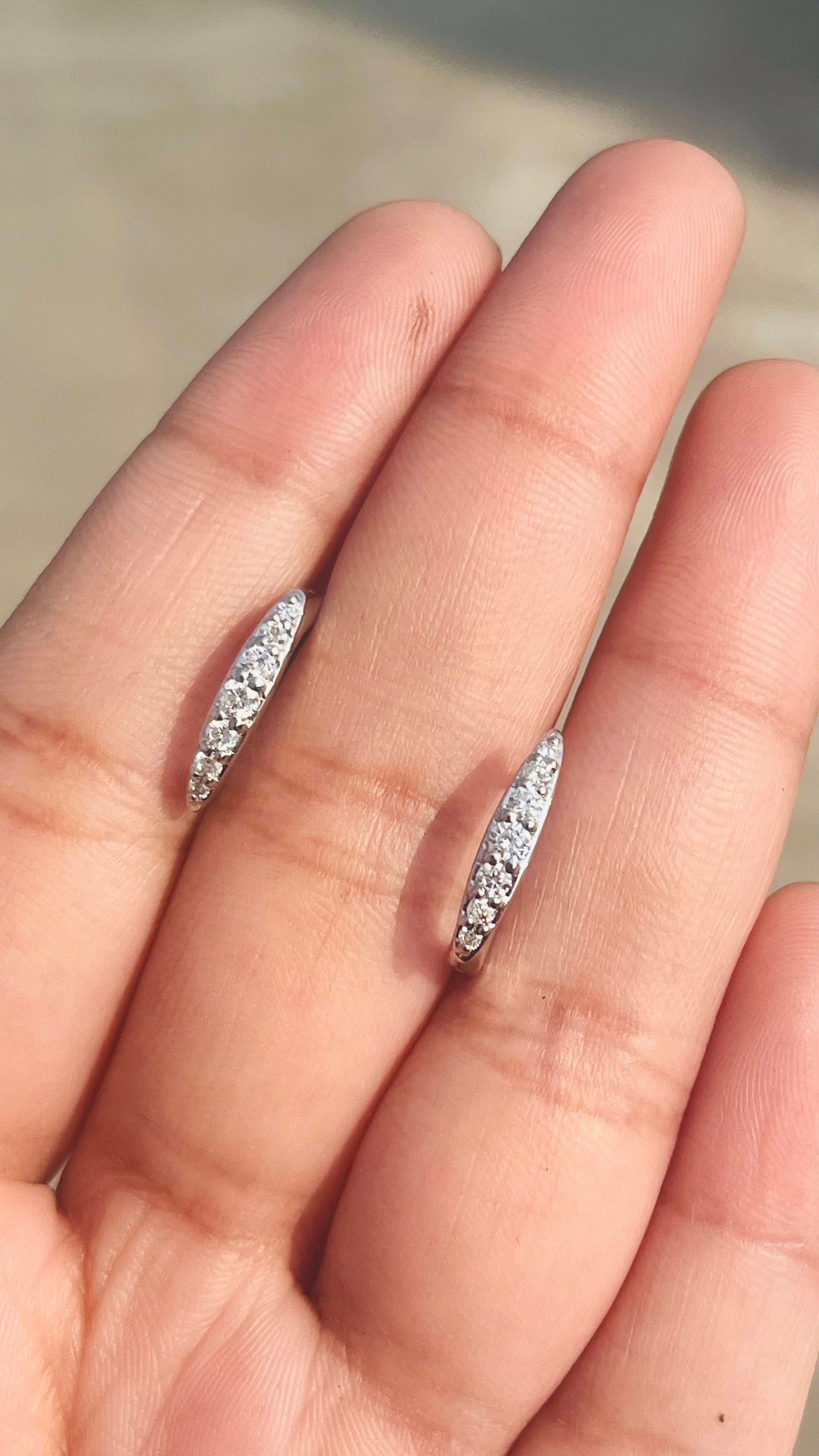 Dainty Diamond Huggie Earrings Set in 18kt Solid White Gold with Shared Prongs For Sale 4