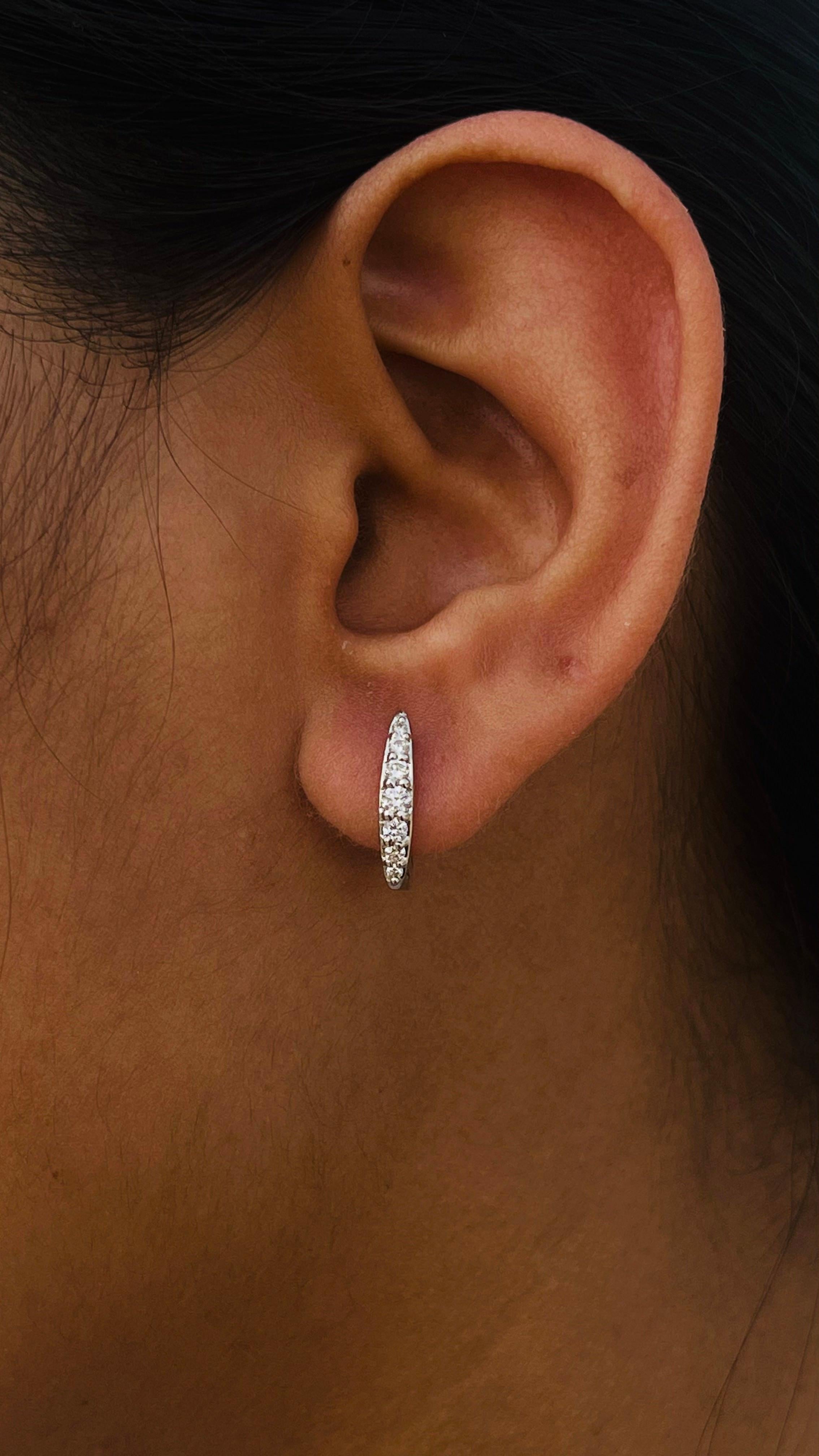 Modernist Dainty Diamond Huggie Earrings Set in 18kt Solid White Gold with Shared Prongs For Sale