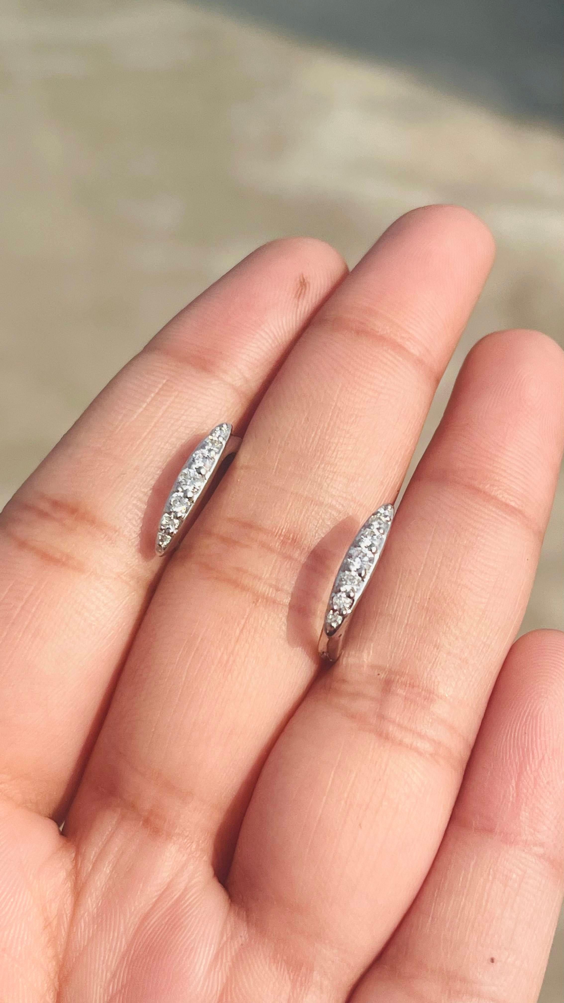 Round Cut Dainty Diamond Huggie Earrings Set in 18kt Solid White Gold with Shared Prongs  For Sale