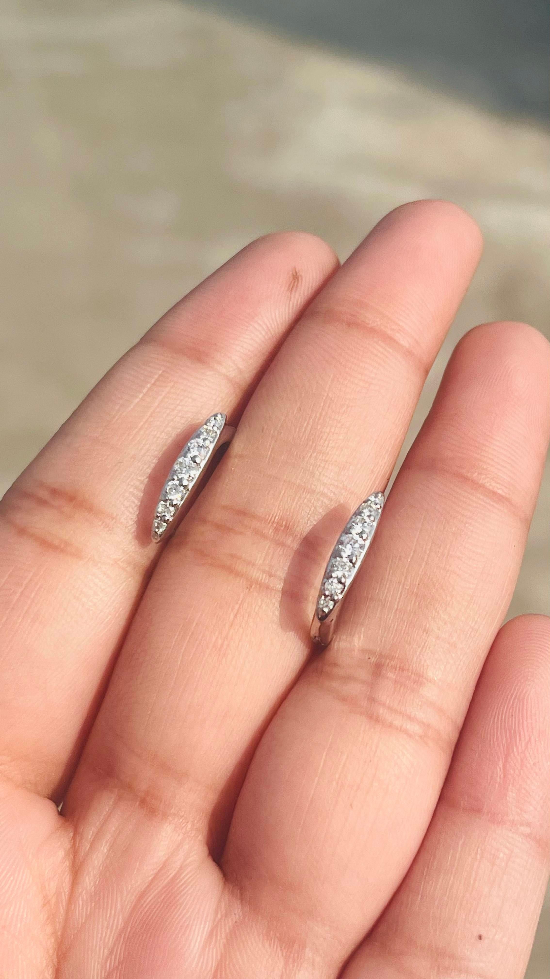 Round Cut Dainty Diamond Huggie Earrings Set in 18kt Solid White Gold with Shared Prongs For Sale