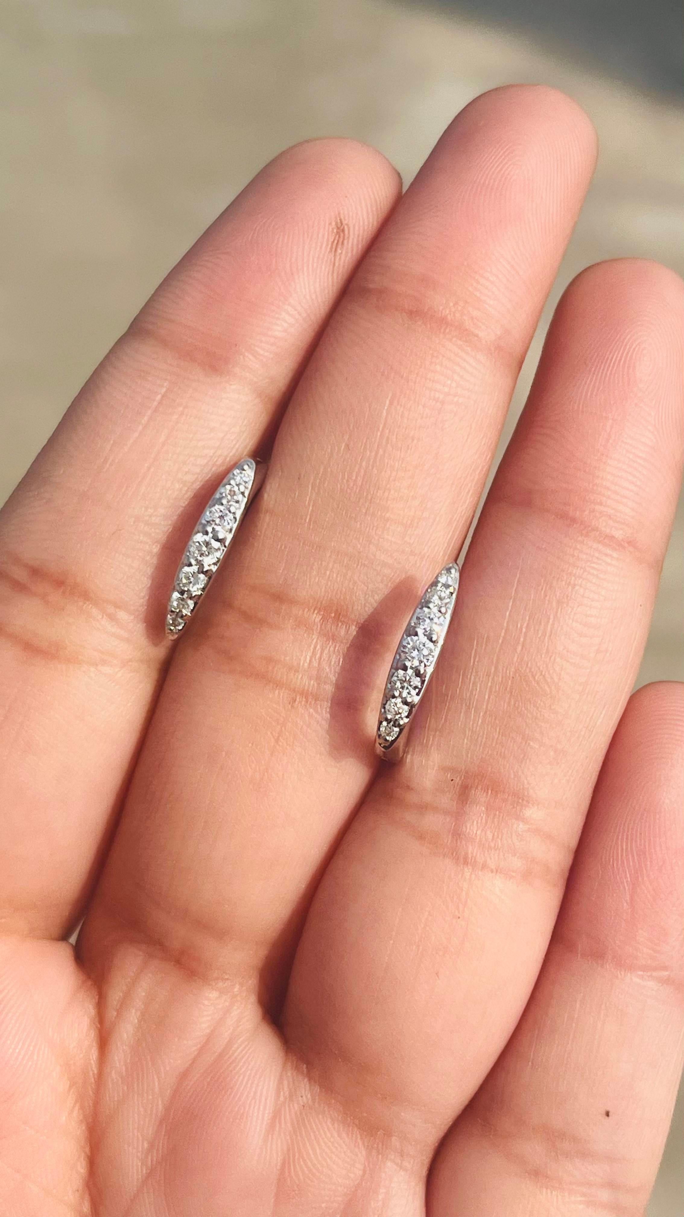 Dainty Diamond Huggie Earrings Set in 18kt Solid White Gold with Shared Prongs For Sale 1