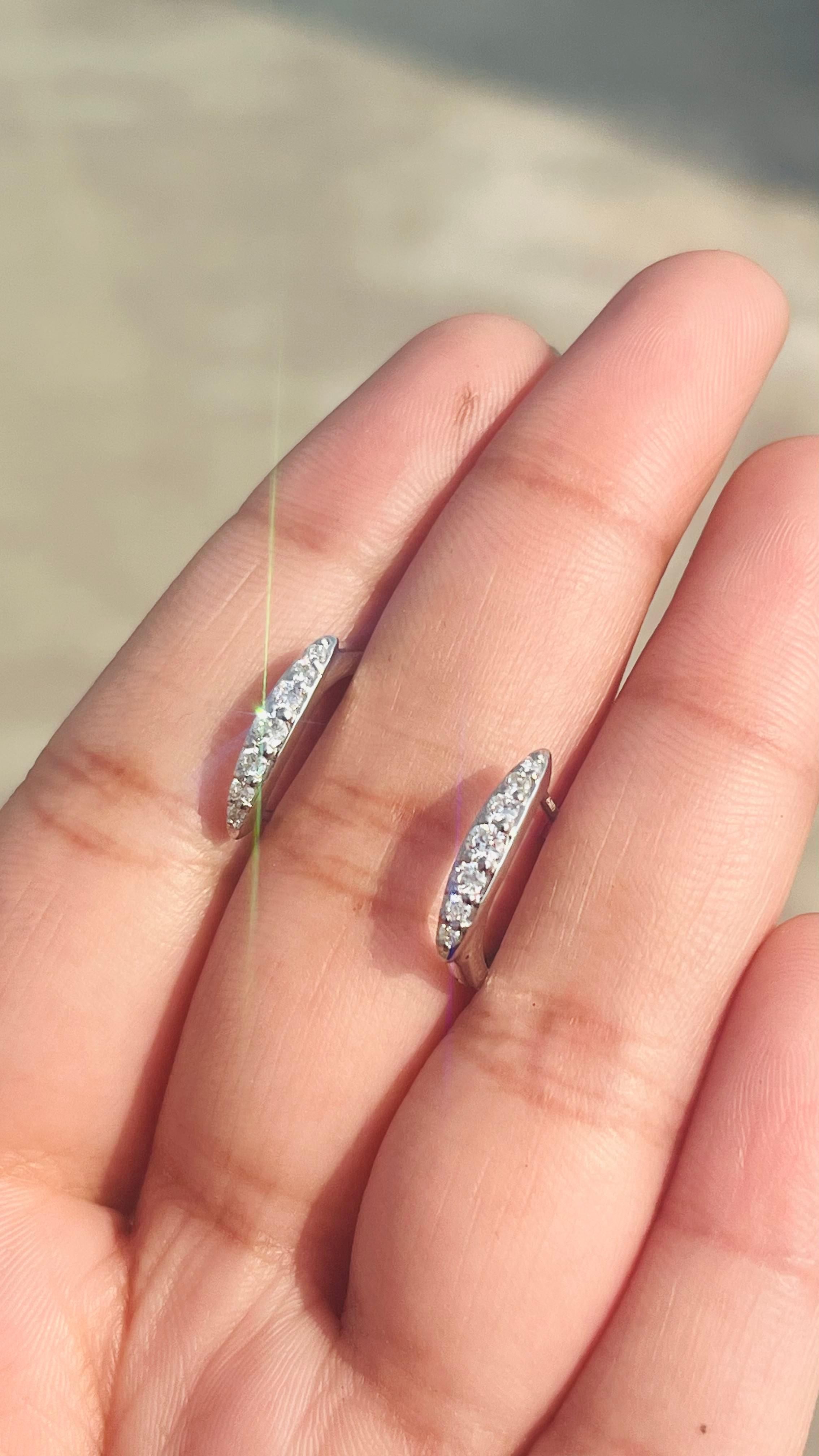 Dainty Diamond Huggie Earrings Set in 18kt Solid White Gold with Shared Prongs For Sale 3