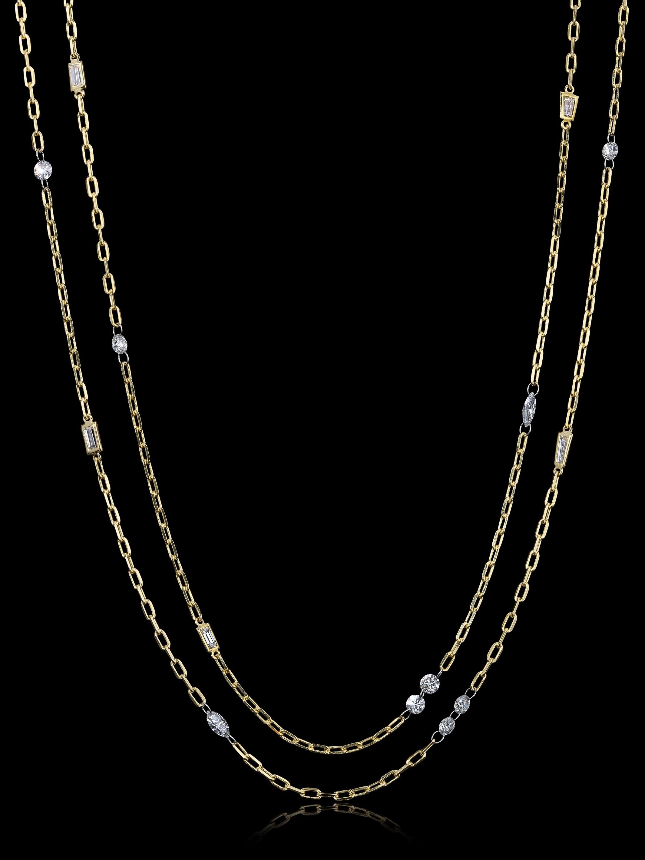 Diamonds by the yard anyone?  This necklace although dainty is absolutely stunning and elegant.  

This elegant Italian short-link solid 18K yellow gold chain is dressed up with diamonds to create that subtle sparkle to add to your outfit. This