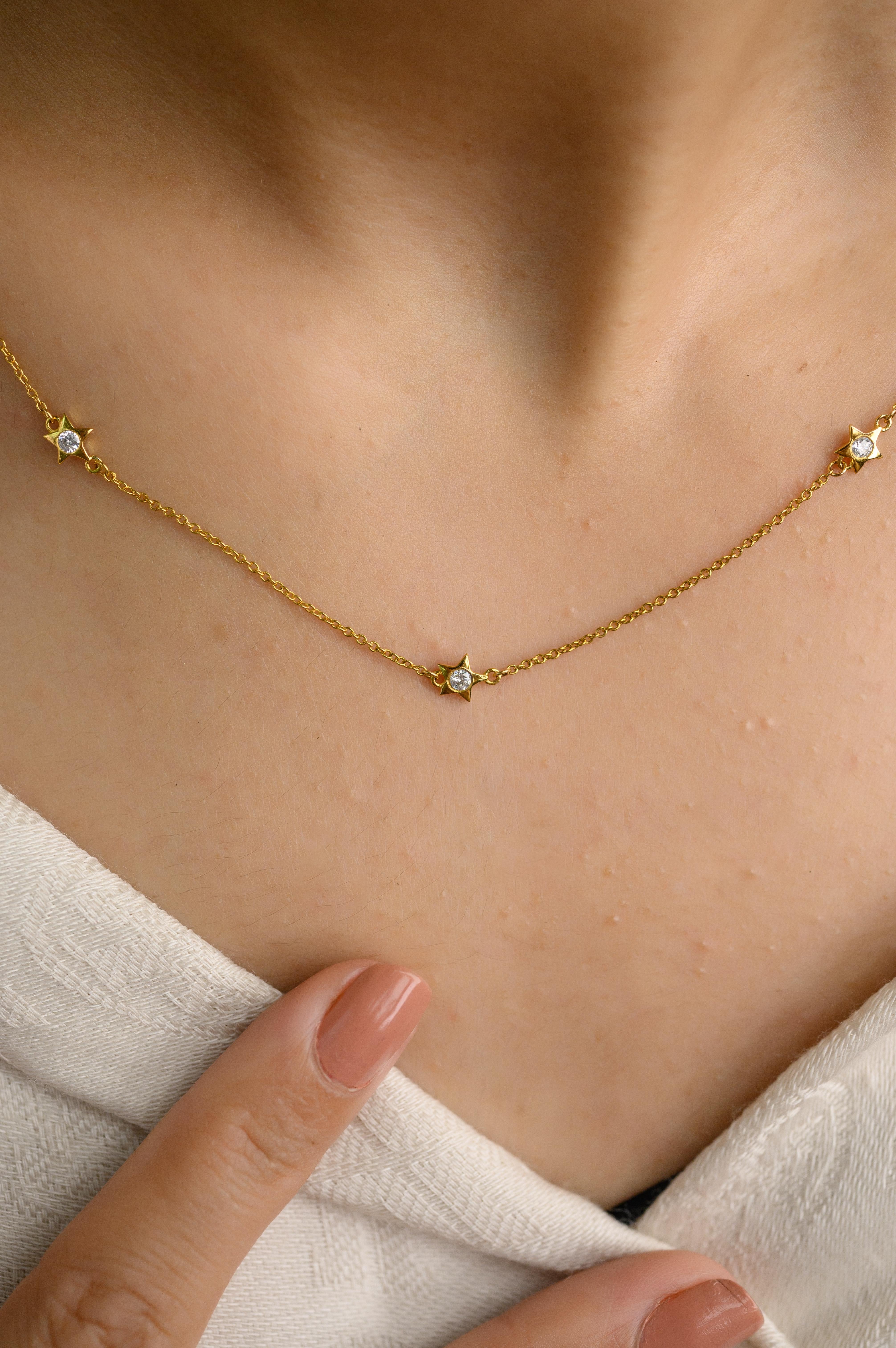 Dainty Diamond Star Chain Necklace in 14K Gold studded with round cut diamond. This stunning piece of jewelry instantly elevates a casual look or dressy outfit. 
April birthstone diamond brings love, fame, success and prosperity.
Designed with three