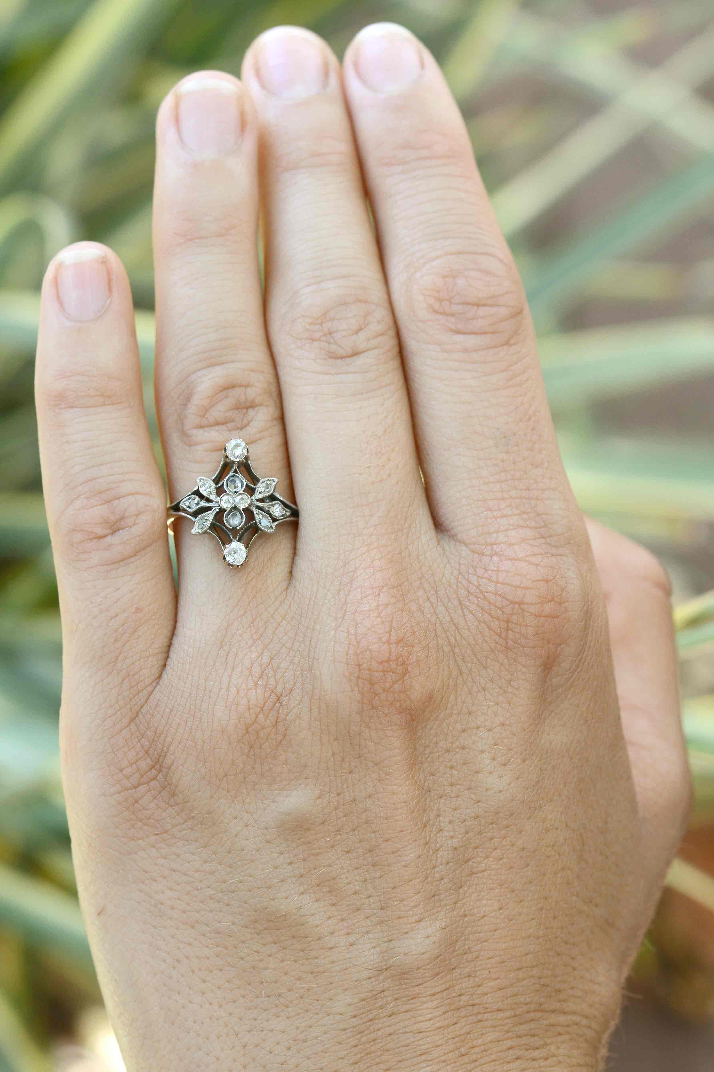 The Oakland Art Nouveau engagement ring. This is a dainty diamond vine design, original antique treasure that can double as a wedding band. We fawn over the floral, lacy milgrain, old mine cut and rose cut diamonds of this vintage estate ring