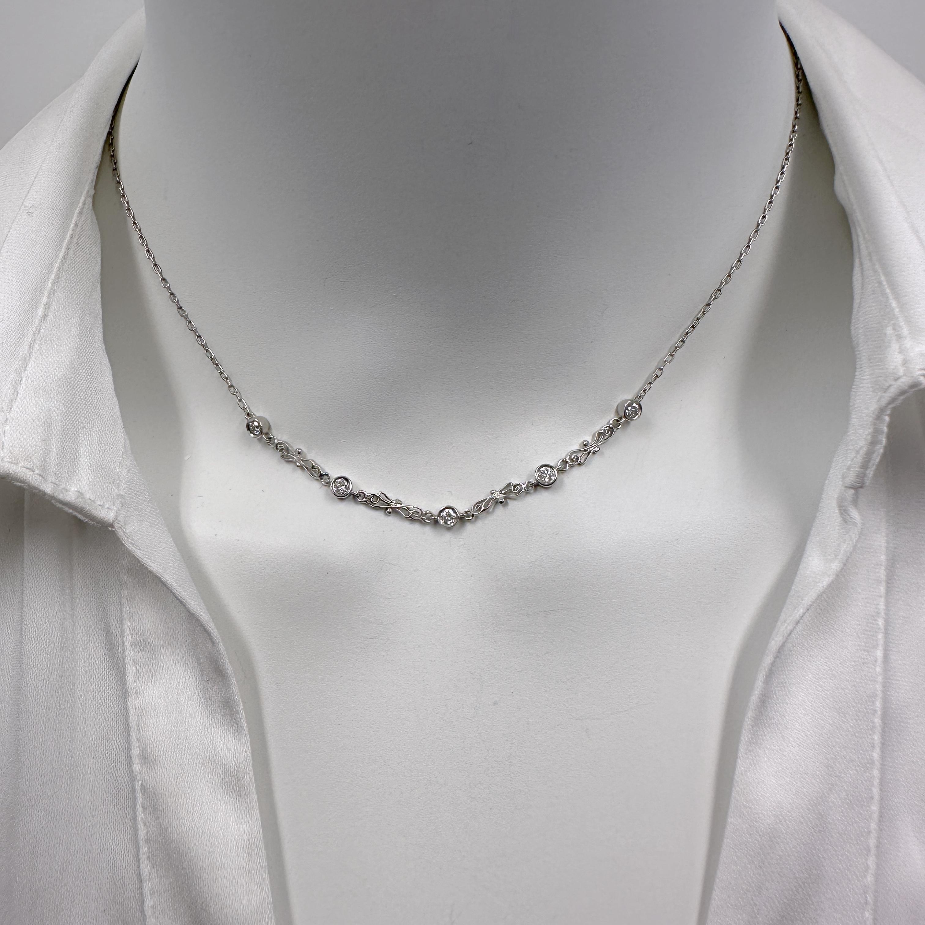 This lovely necklace is assembled from an antique platinum chain plus some very nice 