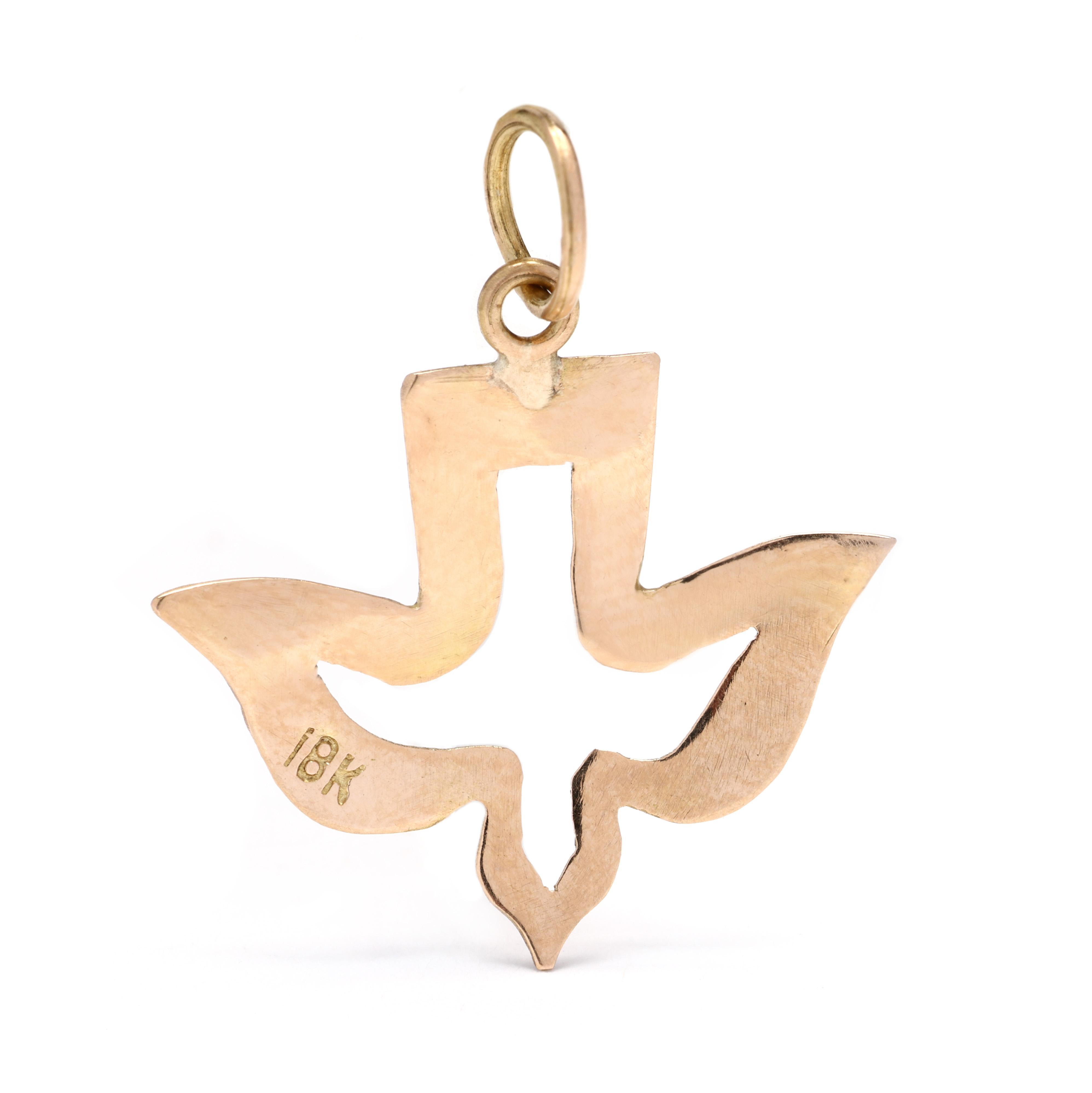 This dainty dove charm is a beautiful addition to any necklace or bracelet. Made from 18K yellow gold, this charm is a luxurious and timeless piece. The charm measures 1 inch in length, making it a delicate and eye-catching addition to your jewelry