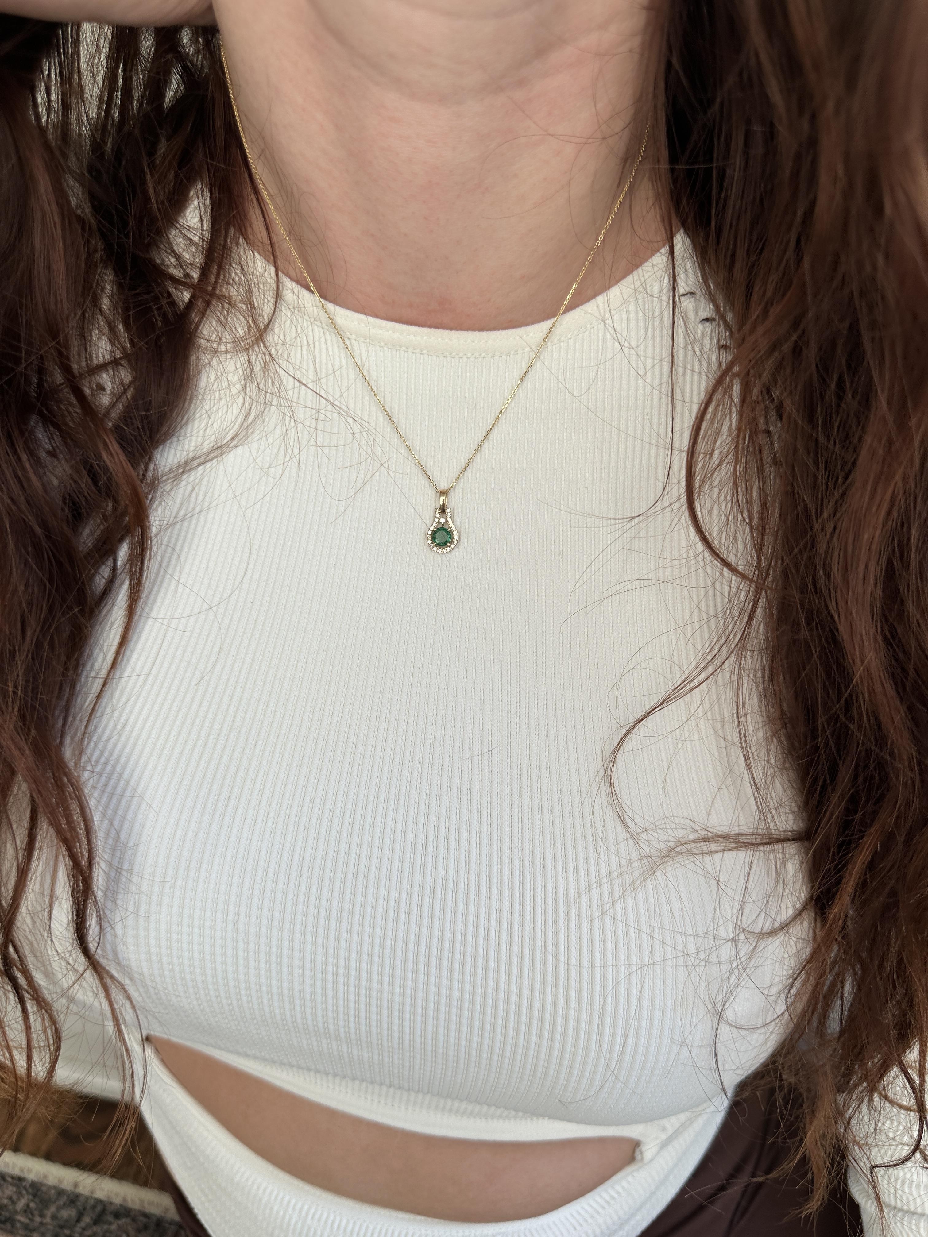 Simplicity meets elegance with our round-shaped Emerald Pendant. Crafted with Earth Mined Diamonds and set in Solid 14K Gold, our Dainty Pendant is the perfect accessory for celebrating May birthdays or adding a touch of luxury to any outfit.
