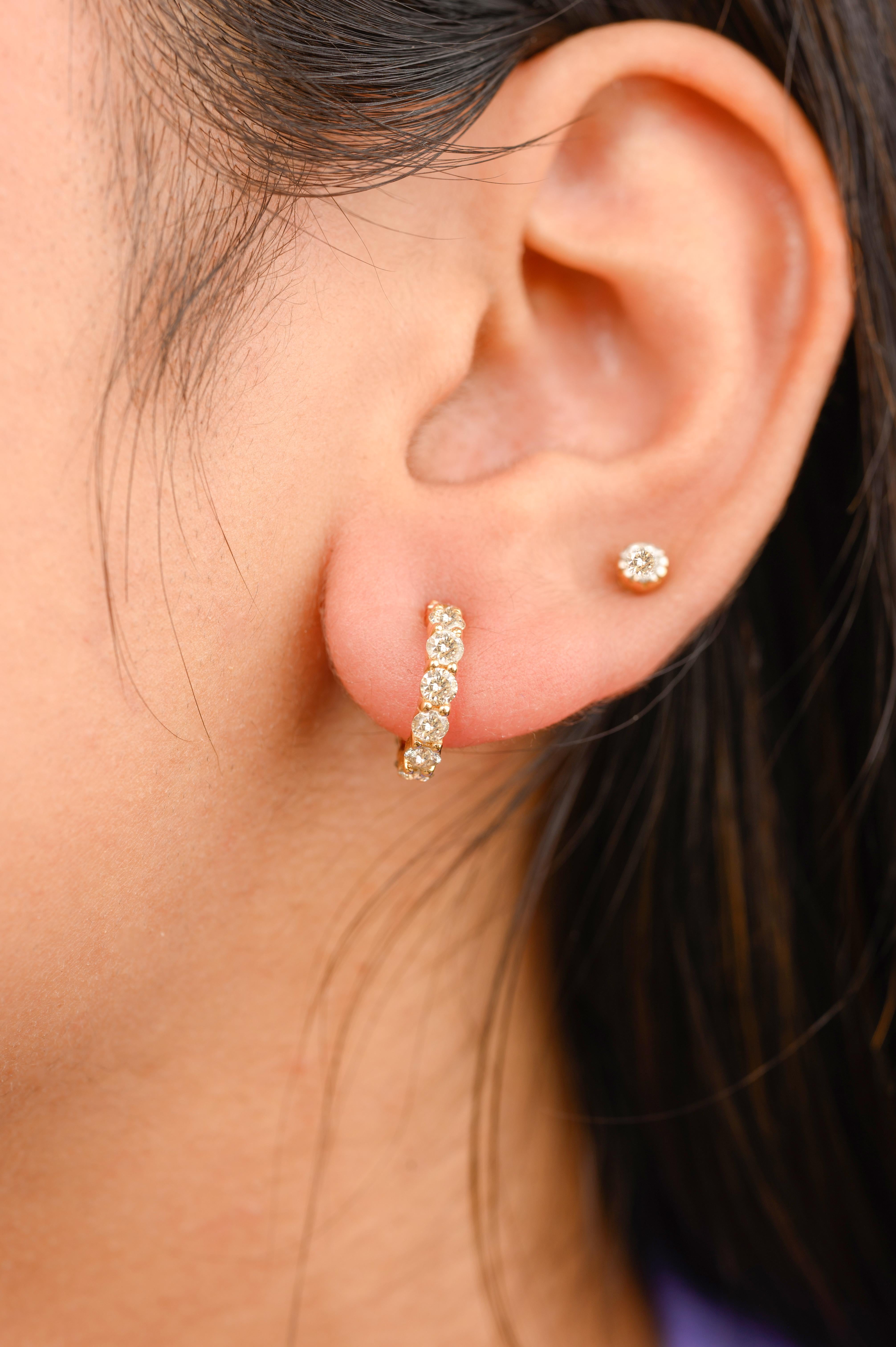 Dainty Everyday Diamond Hoop Earrings in 18K Gold to make a statement with your look. You shall need stud earrings to make a statement with your look. These earrings create a sparkling, luxurious look featuring round cut diamonds.
April birthstone