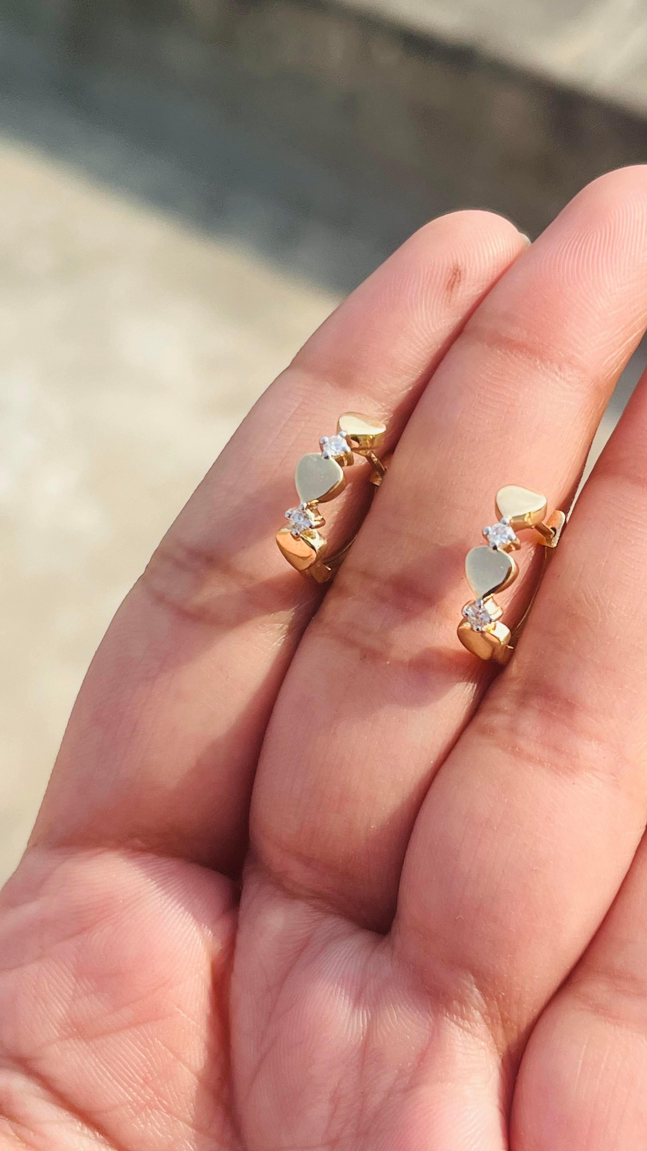 Dainty Love Heart Diamond Huggie Hoop Earrings in 14Karat Solid Yellow Gold In New Condition For Sale In Houston, TX