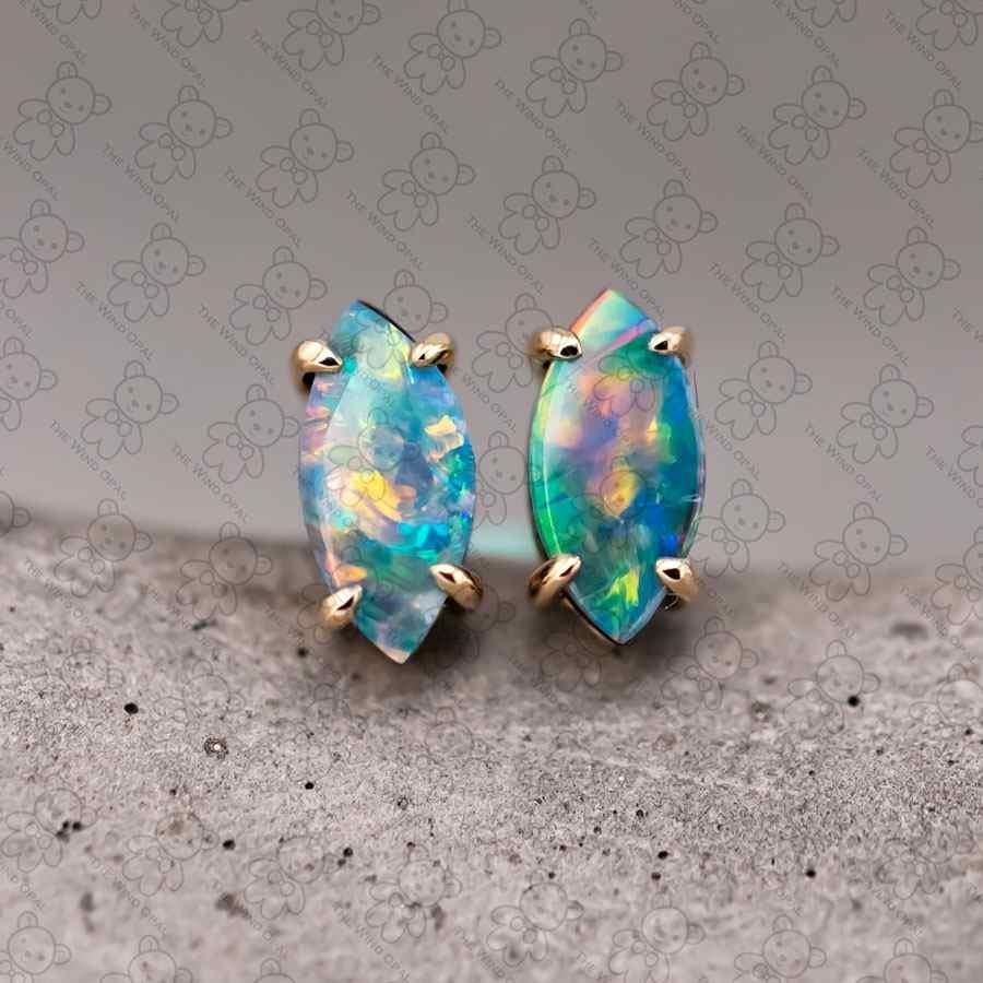 Dainty Marquise-Cut Australian Doublet Opal Stud Earrings 18K Yellow Gold.


Free Domestic USPS First Class Shipping!  Free One Year Limited Warranty!  Free Gift Bag or Box with every order!



Opal—the queen of gemstones, is one of the most