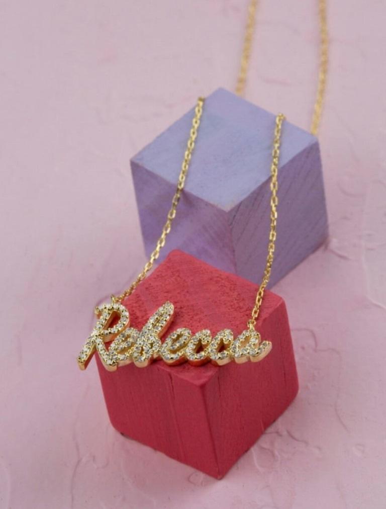 Dainty Gold Name Necklace 14K Solid Gold Diamond Name Necklace Personalize : d Gift
Léger, il peut être porté tous les jours

Informations complémentaires :
Condit : Nouveau sans étiquette : Un article neuf, non utilisé et non porté (y compris les