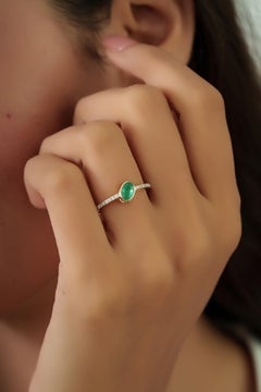Dainty Oval Cut Emerald & Diamond East-West Ring in 14K Yellow Gold Bezel Set