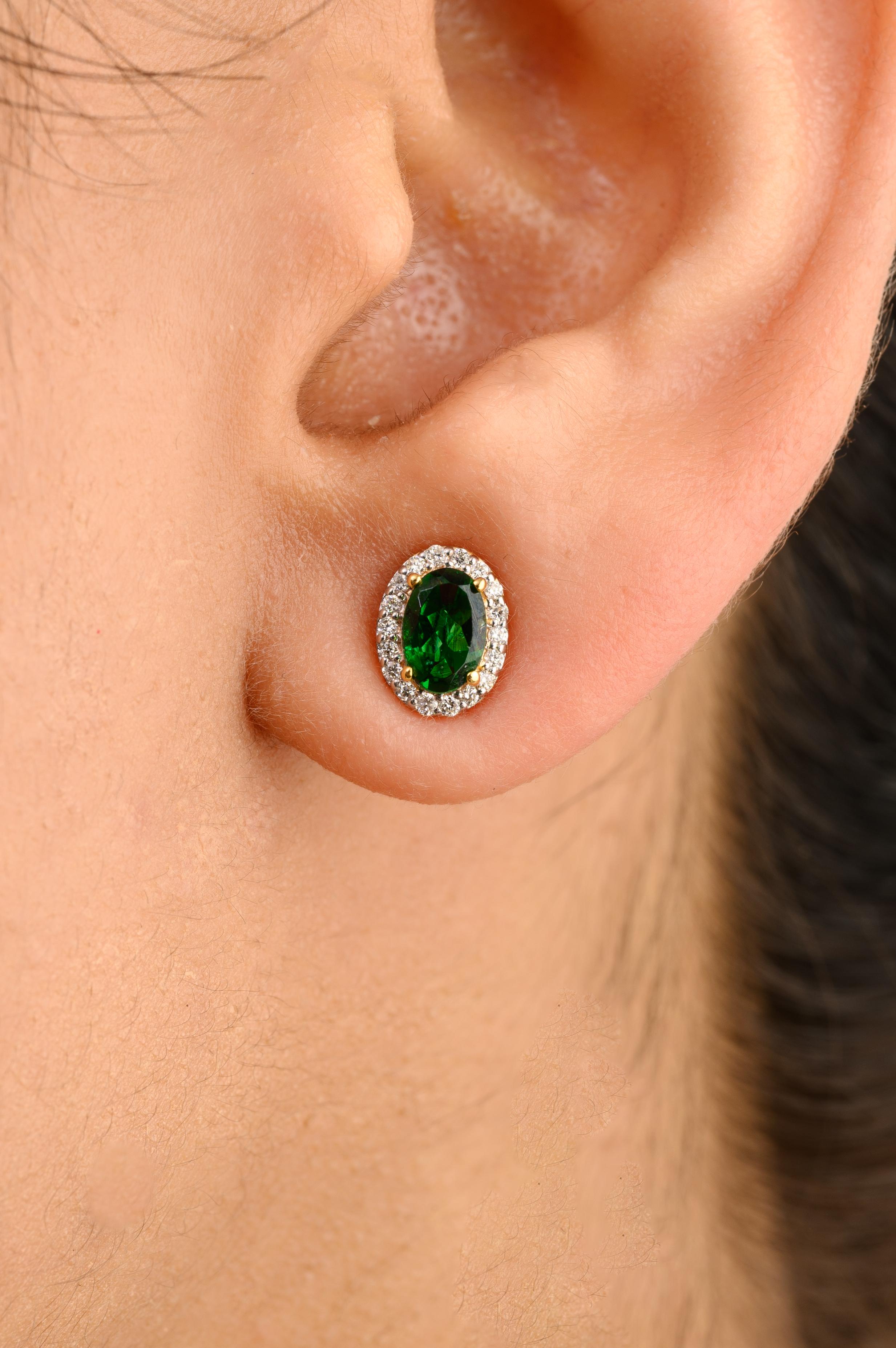 Dainty Oval Green Tourmaline Halo Diamond Stud Earrings in 14K Gold to make a statement with your look. You shall need small stud earrings to make a statement with your look. These earrings create a sparkling, luxurious look featuring oval cut