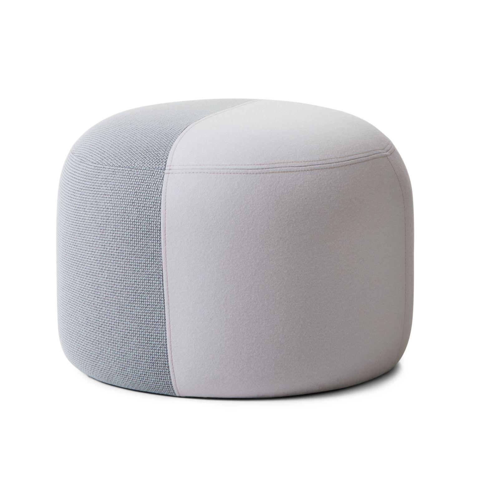 Dainty Pouf minty grey cloudy white by Warm Nordic
Dimensions: D 55 x H 39 cm
Material: Textile upholstery, Wooden frame, foam.
Weight: 9.5 kg
Also available in different colours and finishes.

Sophisticated, two-coloured pouf with soft shapes and a
