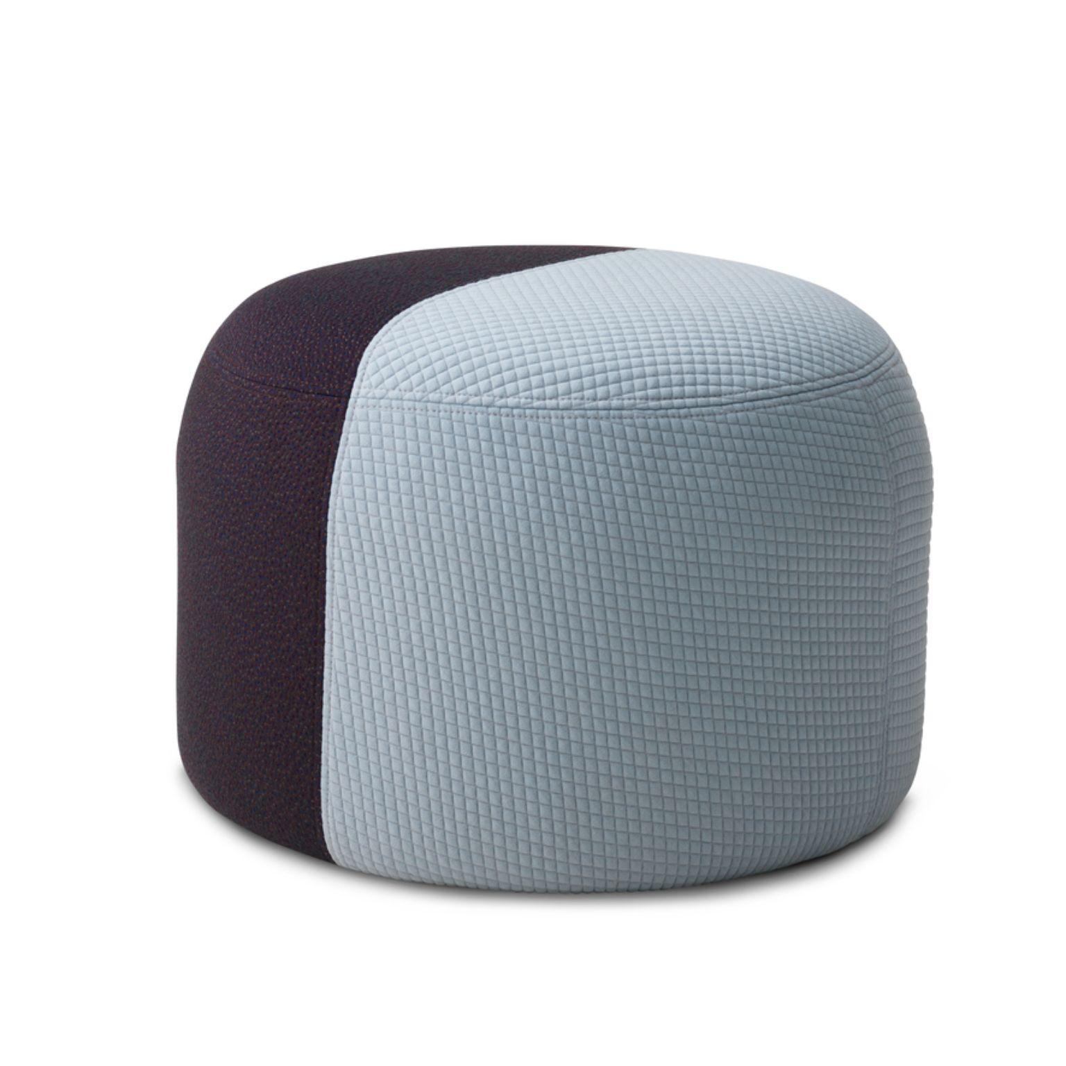 Dainty Pouf Mosaic light blue eggplant by Warm Nordic
Dimensions: D 55 x H 39 cm
Material: Textile upholstery, Wooden frame, foam.
Weight: 9.5 kg
Also available in different colours and finishes.

Sophisticated, two-coloured pouf with soft shapes