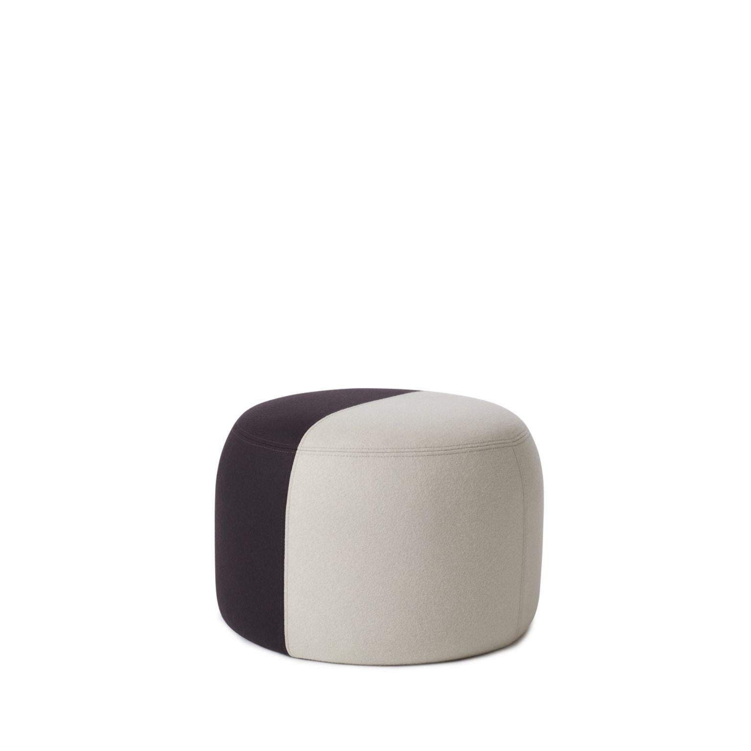 Dainty Pouf Pearl grey black by Warm Nordic
Dimensions: D 55 x H 39 cm
Material: Textile upholstery, Wooden frame, foam.
Weight: 9.5 kg
Also available in different colours and finishes.

Sophisticated, two-coloured pouf with soft shapes and a clean