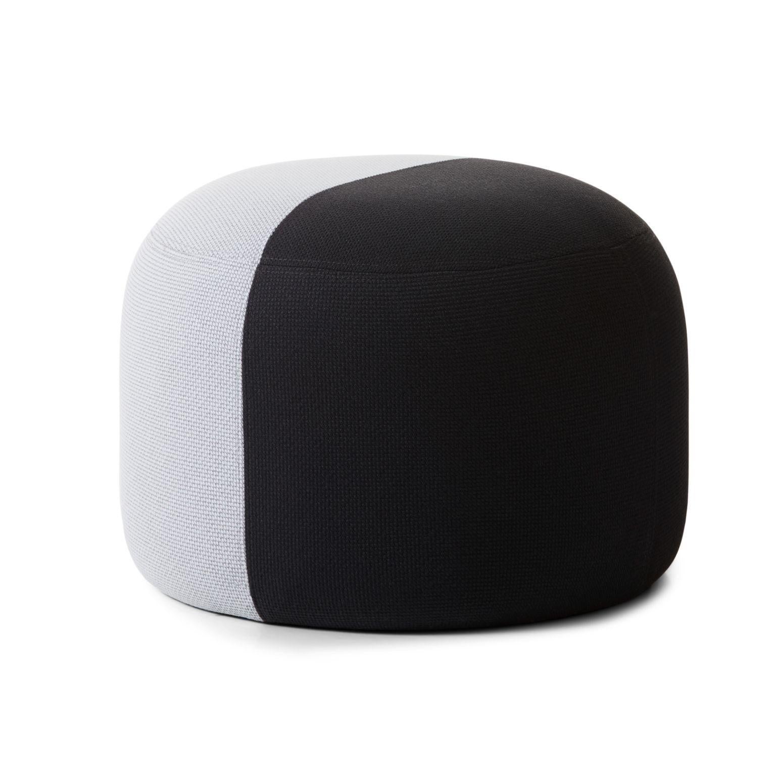 Dainty Pouf Soft Grey Coral Black by Warm Nordic
Dimensions: D55 x H 39 cm
Material: Textile upholstery, Wooden frame, foam.
Weight: 9.5 kg
Also available in different colours and finishes. Please contact us.

Sophisticated, two-coloured pouf