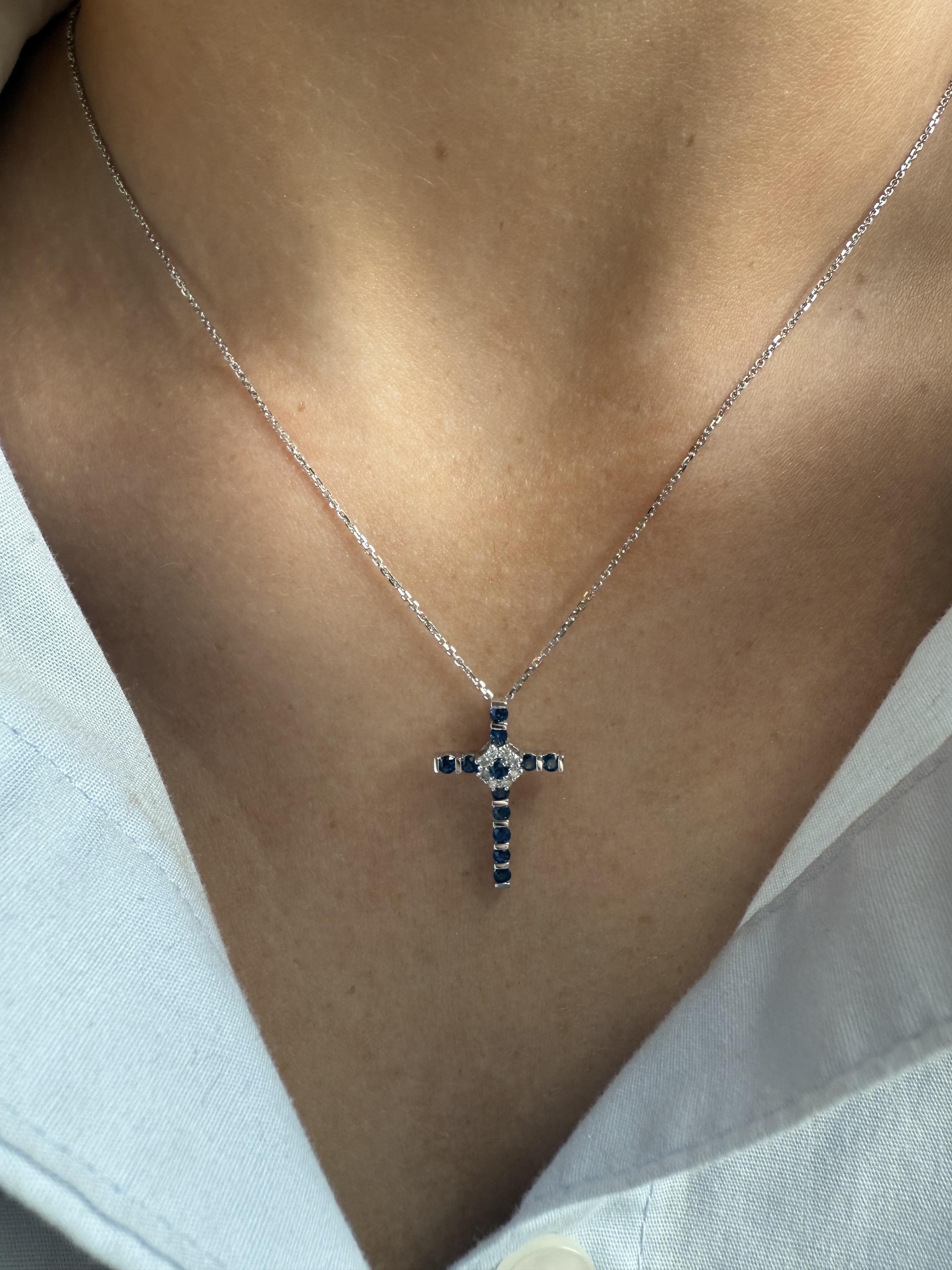 We are loving the vibrant sapphires in this dainty cross!!

Necklace Details
Material: 14K White Gold
Era: Modern
Cross Height: 21.2mm
Cross Width: 13.9mm
Chain Length: 18 Inches
Weight: 2.5 Grams

Accented by the following gemstones
11 - 2mm Round