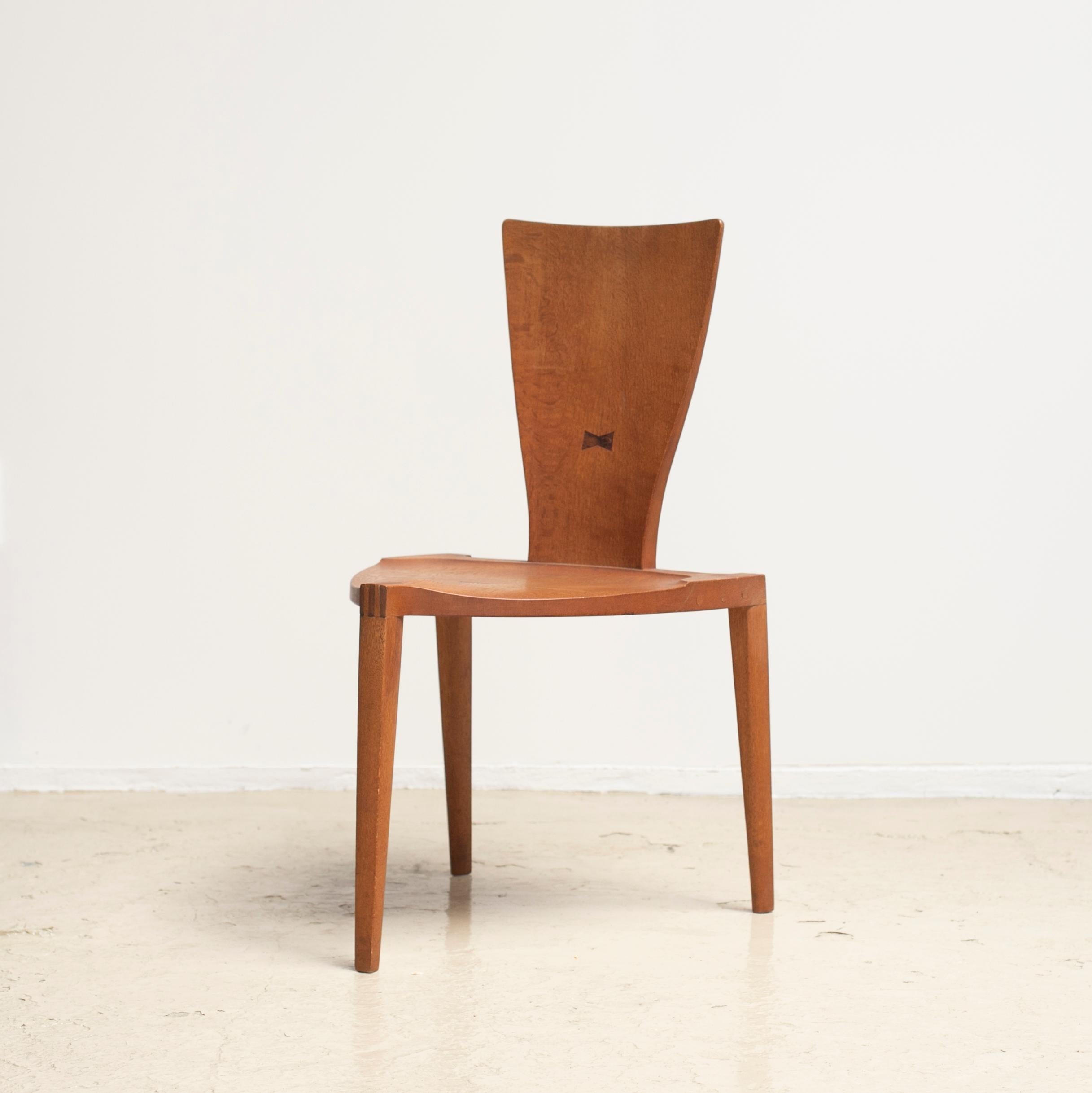 Three legged chair named 