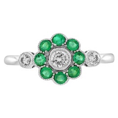 Bague florale en or blanc 14 carats, diamant marguerite et émeraude