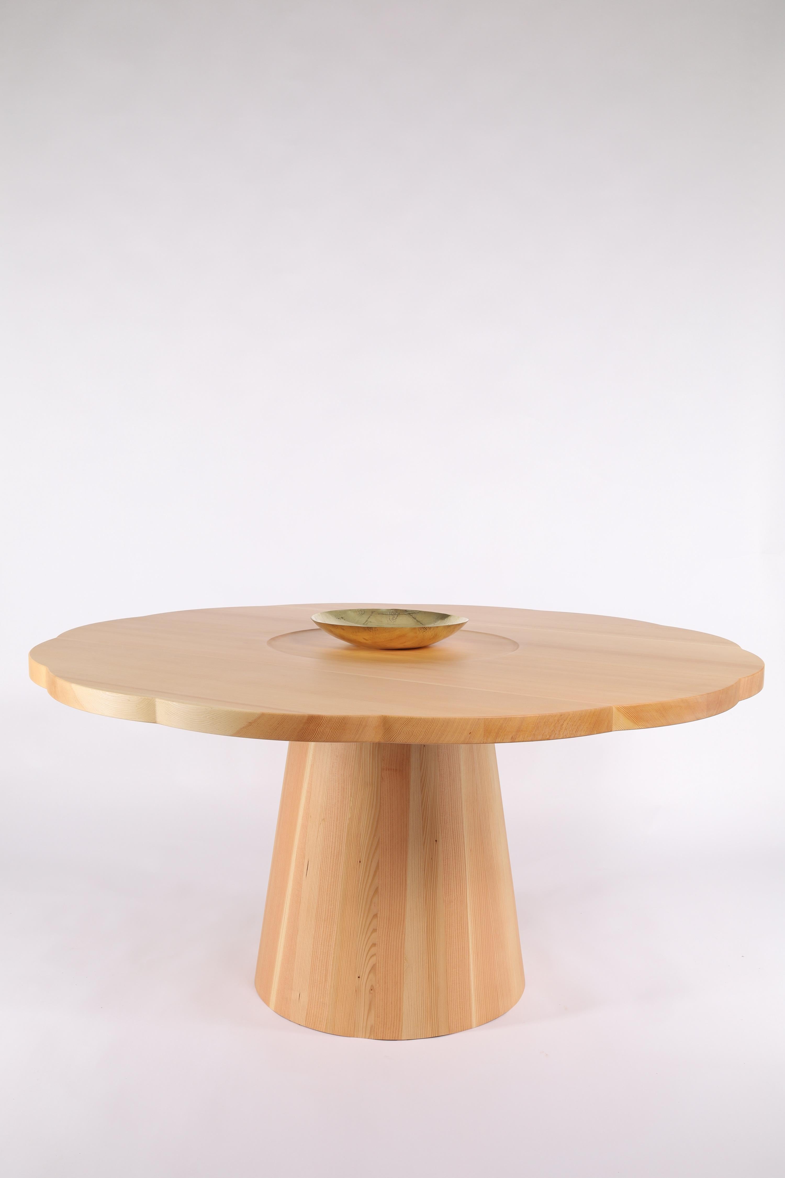 Introducing the Daisy Table, which features a coopered and tapered base entirely hand assembled and finished on the lathe. Floral inspired top pattern with a shallow concaved center disc. Each Daisy Table is paired with a hand formed bowl, created