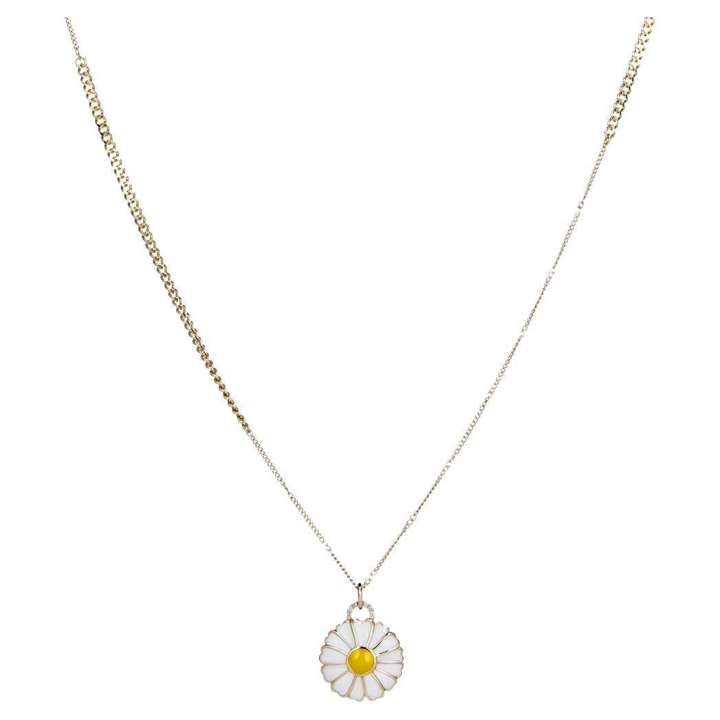 DETAILS
COLOR: Yellow gold
COMPOSITION: 14kt yellow gold
Diasy pendant, white and yellow enamel fill
Diamonds totalling 0.003ct  

SIZE AND FIT
Daisy 15 x 15mm
Chain length 52cm
Adjustable length 45cm
