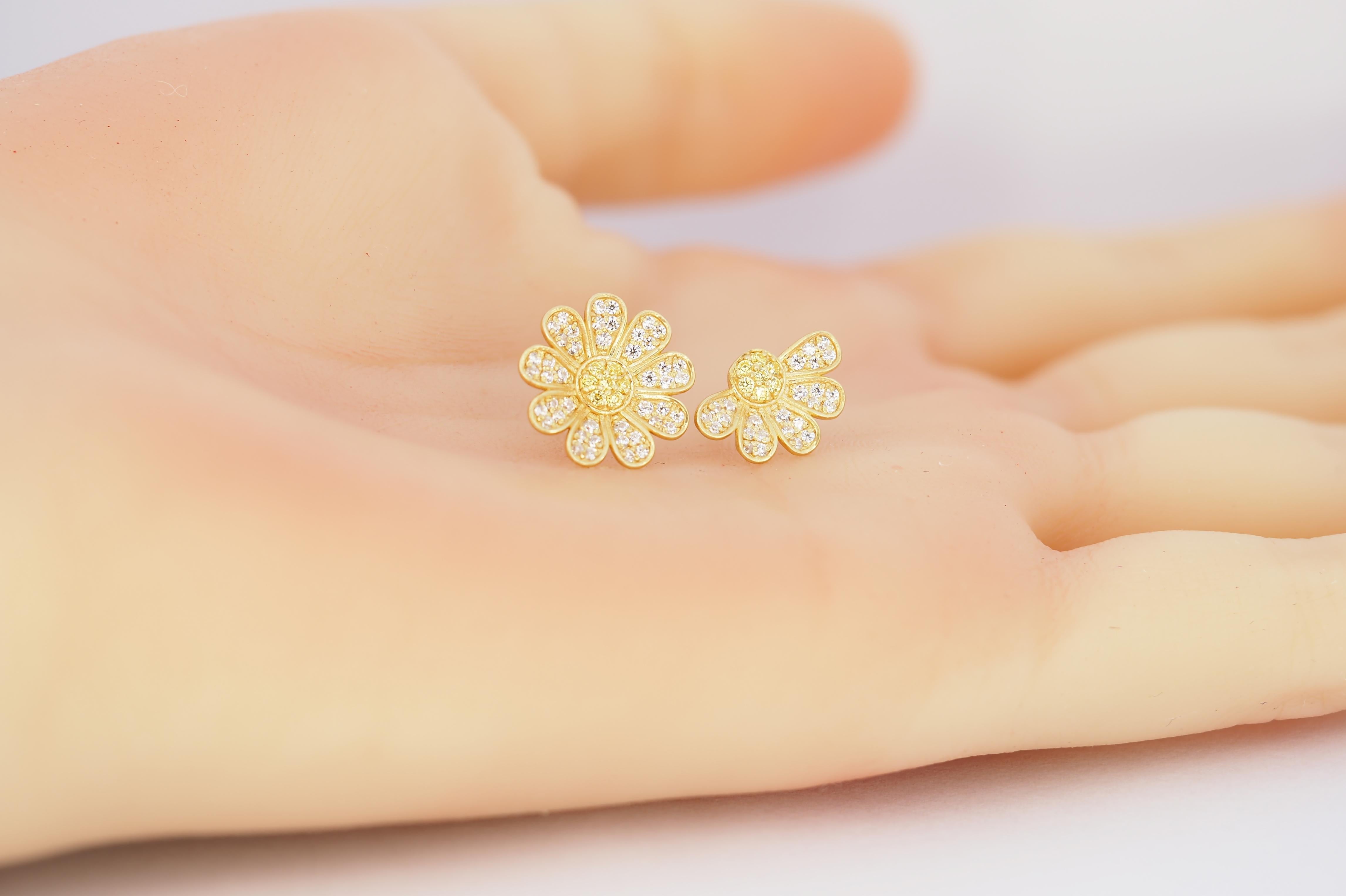 Daisy flower 14k gold earrings studs. Love Me, Love Me Not 14k gold earrings. Floral design earrings with with moissanites and lab sapphires in 14k gold. Vintage style moissanite earrings. Valentines days 14k gold earrings. Lucky gold earrings.