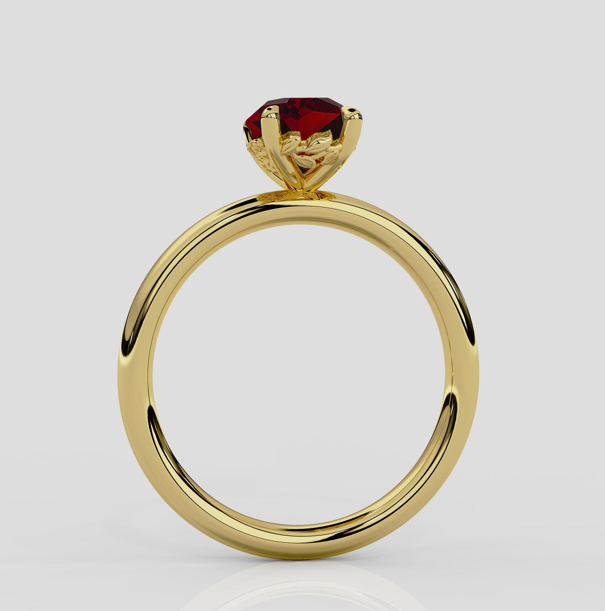 18ct yellow gold 1.8mm engagement ring, adorned with flower and petal detail across the ring's gallery. 

The Daisy engagement ring design is one of our absolute favourites. Looking from the top down, Daisy appears as a classic solitaire engagement