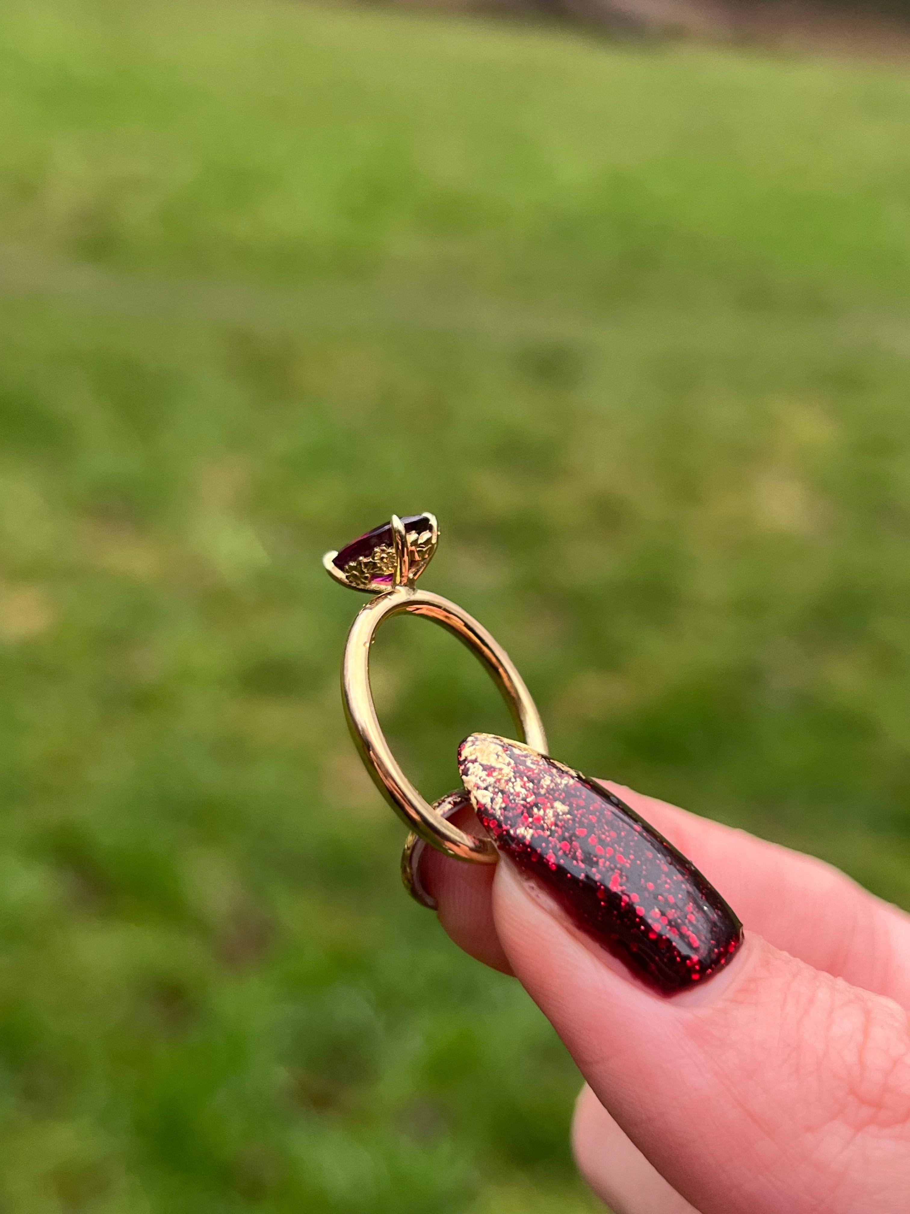 Contemporary 'Daisy' Oval Garnet Engagement Ring in 18ct Yellow Gold For Sale