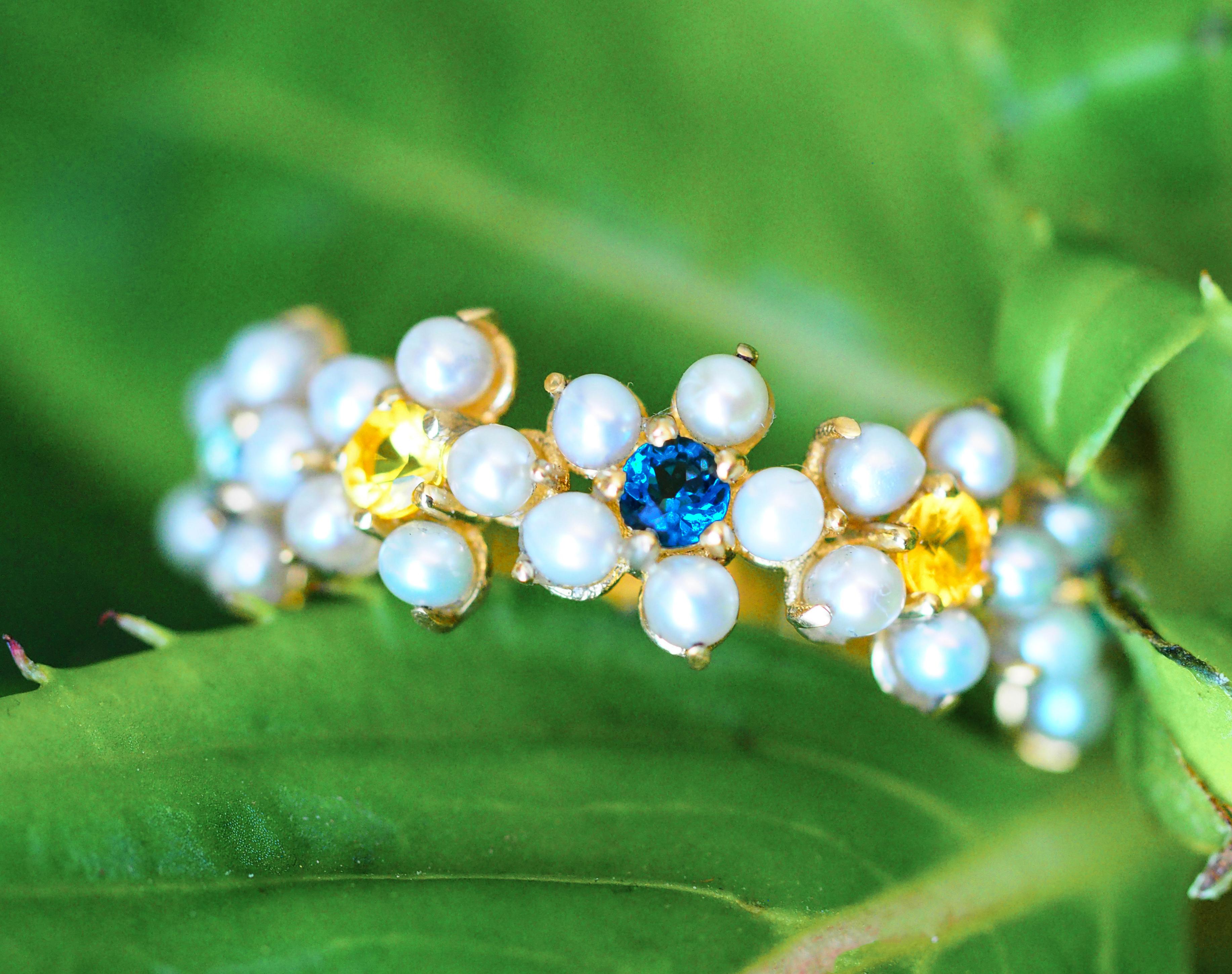 Daisy gold ring with sapphires, pearls. 
Flower 14k gold ring. Semi eternity sapphire gold ring. Blue, yellow sapphire gold ring.

Metal: 14k gold
Weight: 2.11 g. depends from size.

Set with different stones:
Yellow sapphires (2 pieces), london