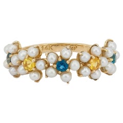 Daisy gold ring with sapphires, pearls. 