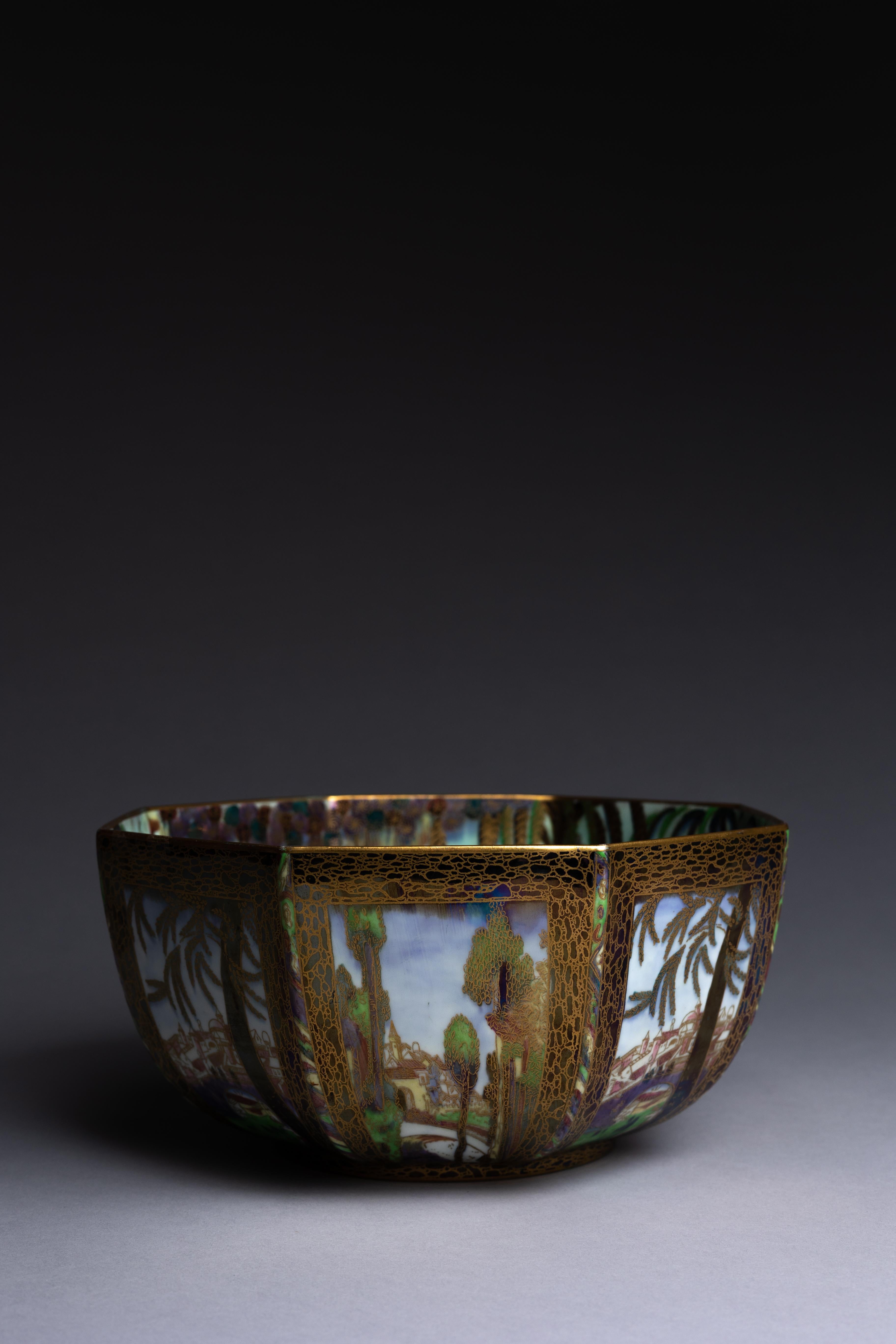 A Wedgwood Fairyland lustre bowl designed by Daisy Makeig-Jones ca. 1920 and decorated with the 'Castle on a Road' pattern on the exterior and the 'Fairy in a Cage' pattern on the interior.

Daisy Makeig-Jones is best known for the Fairyland