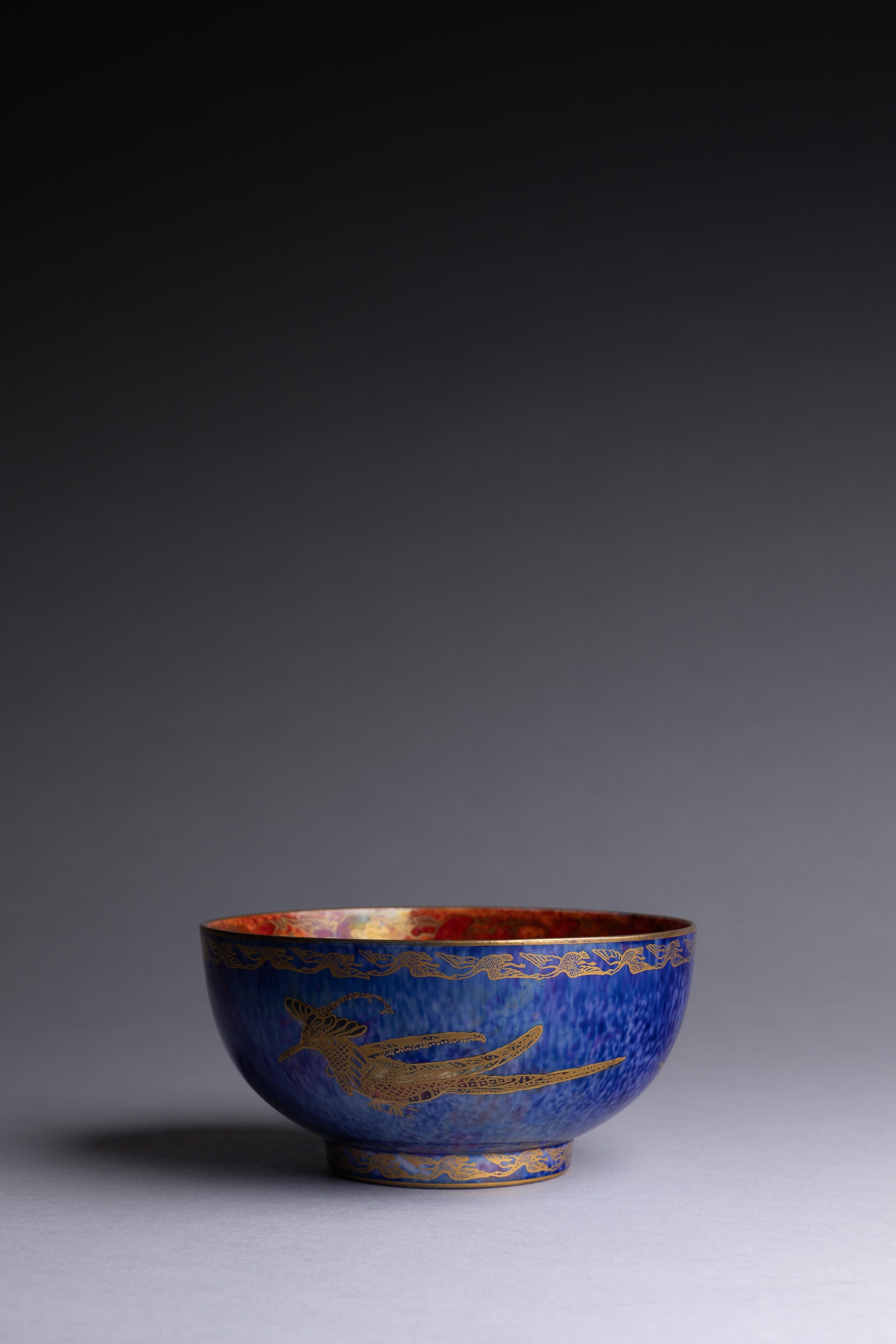 A Wedgwood blue lustre bowl decorated with hummingbirds, designed by Daisy Makeig-Jones circa 1920. 

Daisy Makeig-Jones’s lustreware provided respite from the horrors of World War I and brought new life to a tired Wedgwood Factory. Makeig-Jones’s