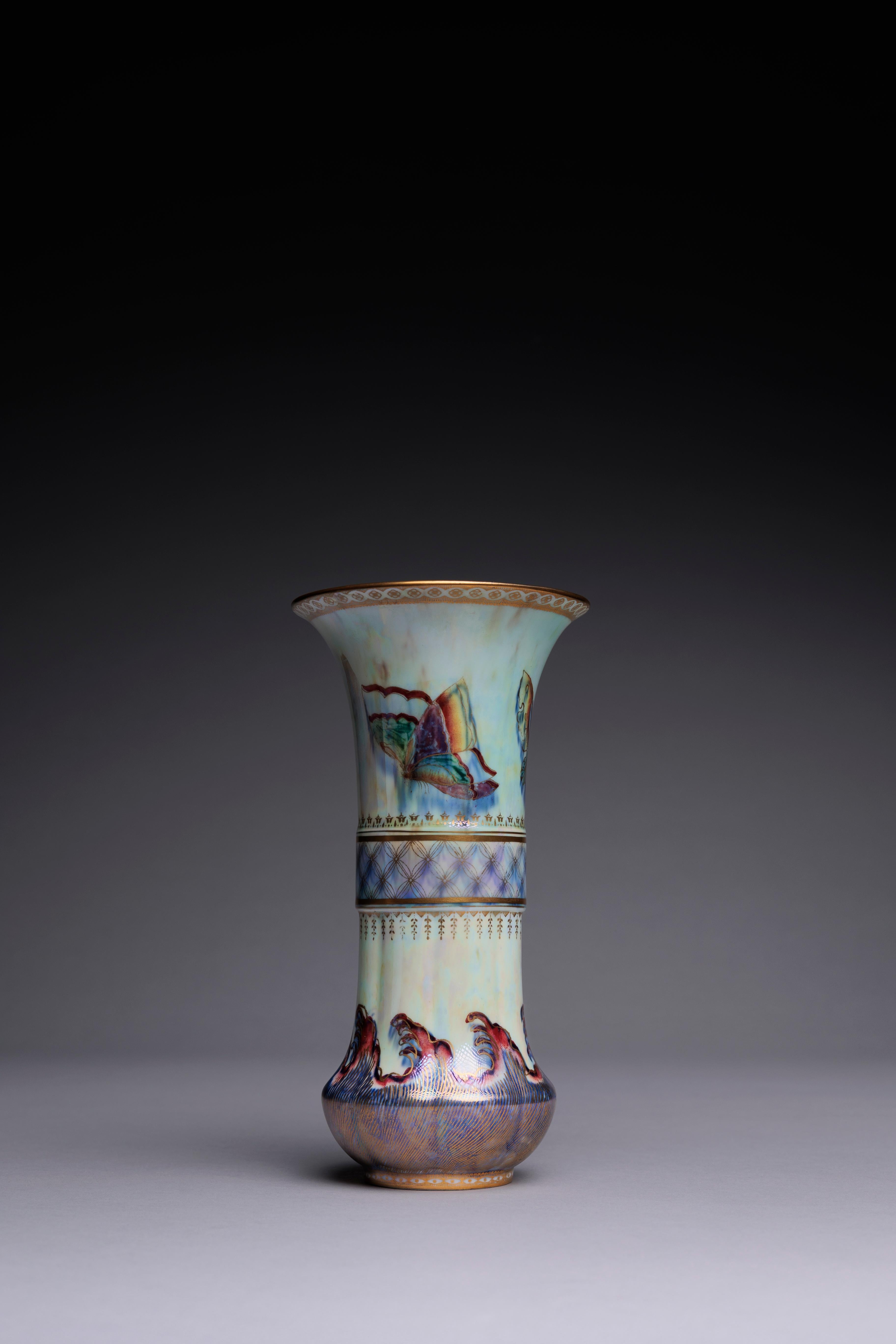 A Wedgwood Lustre Butterfly vase designed by Daisy Makeig-Jones circa 1915 as part of her revolutionary Ordinary Lustres line at the manufactory.

This Wedgwood lustreware vase is a unique application of Daisy Makeig-Jones’s ‘Butterfly’ pattern. The