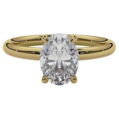 Anello di fidanzamento con diamante ovale naturale da 1 centesimo "Daisy" in oro giallo 18 carati