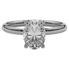 Used 'Daisy' 1ct Natural Oval Diamond Engagement Ring in Platinum