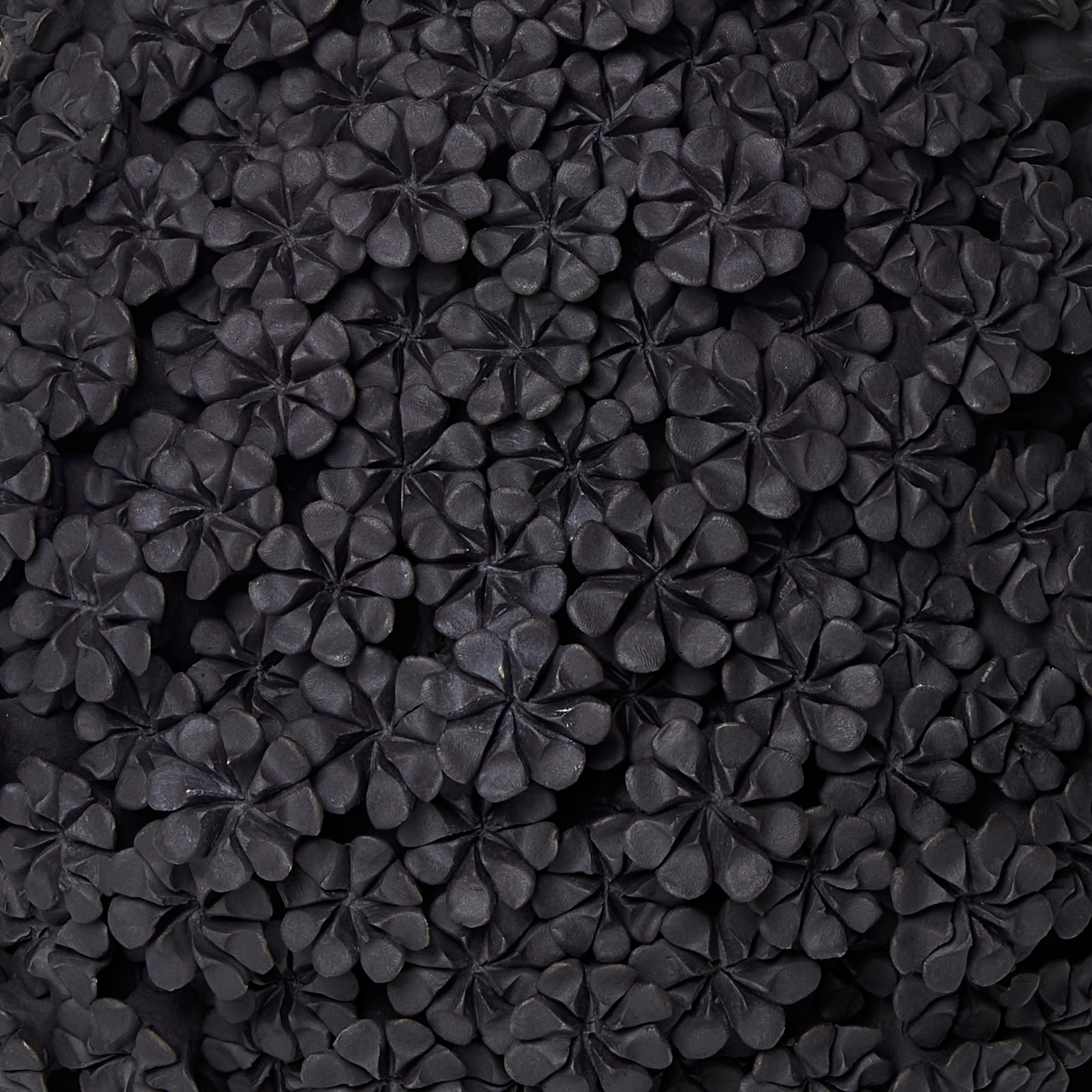 Organic Modern Daisy Teardrop, a Floral Black Stoneware Ceramic Sculpture by Vanessa Hogge