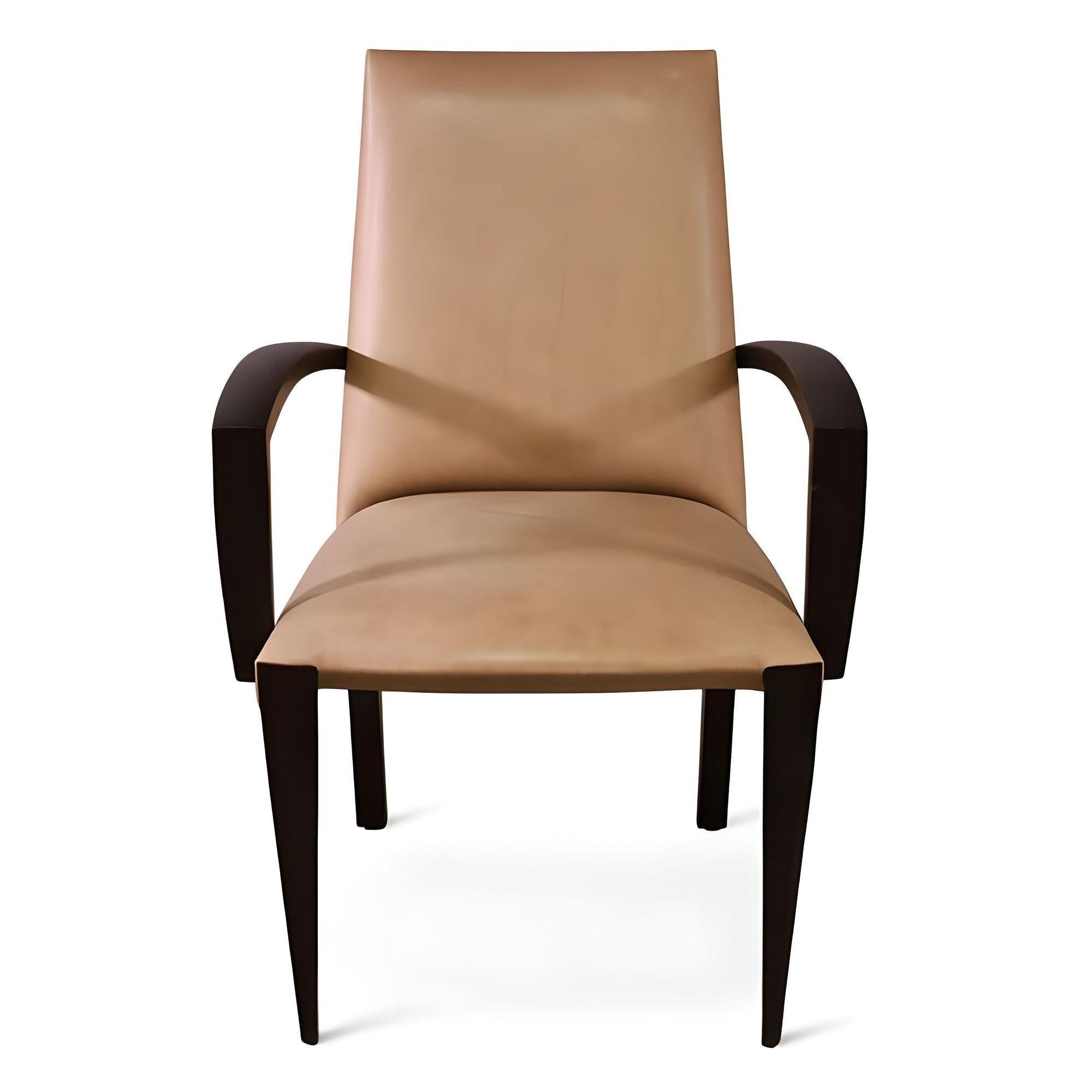 The Ke-Zu chair features in Dakota Jackson's classic Ke-Zu Collection. It is characterized by a form-fitted design that is luxuriously sculpted to the body with leather seating. There are no straight lines on the upholstery which is sewn as a single