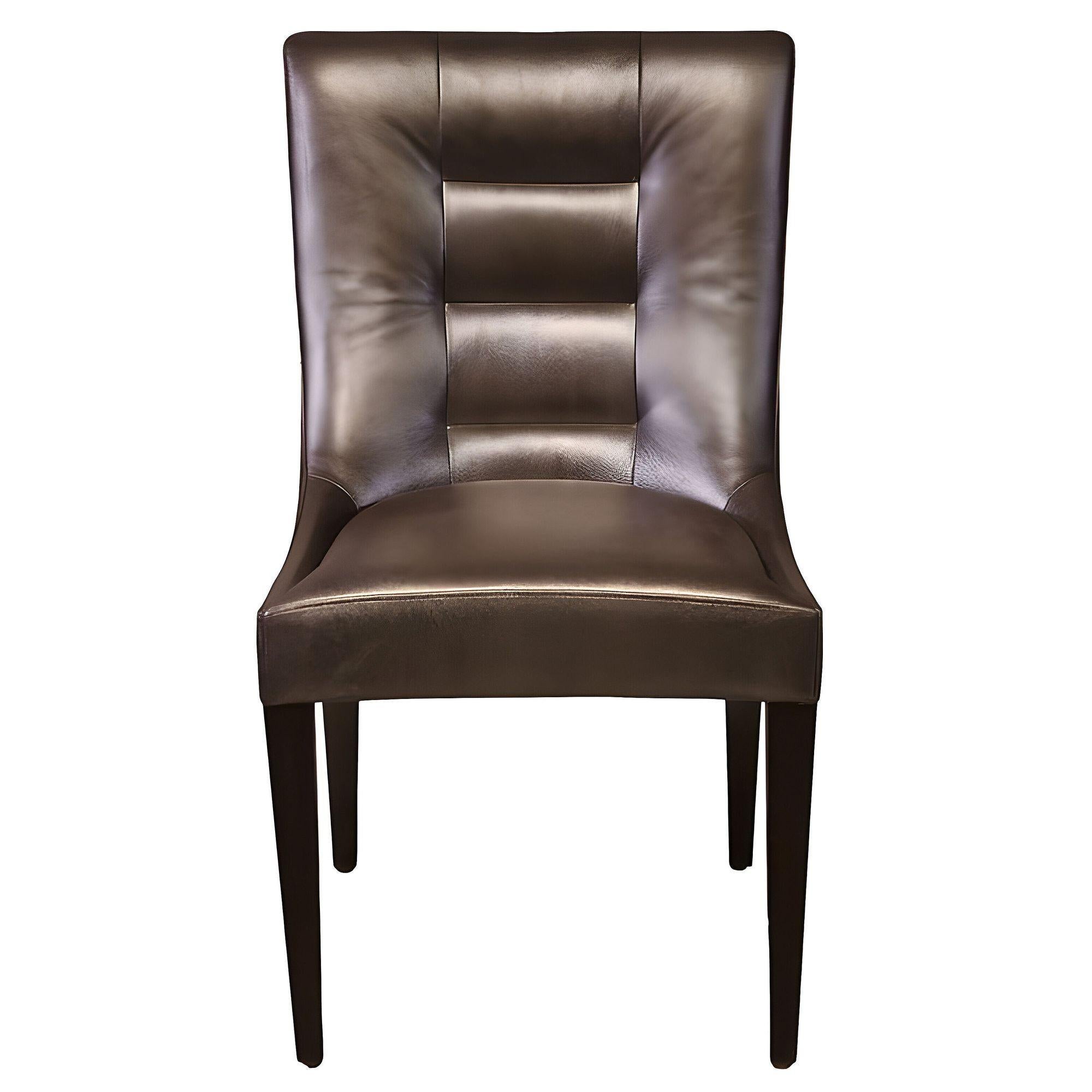 Dakota Jackson designed Pull Up side Chair with sculptural beauty is found at the intersection of the back and the leg, as the wood contours in two directions simultaneously. The solid wood leg extends the entire height of the piece, becoming a