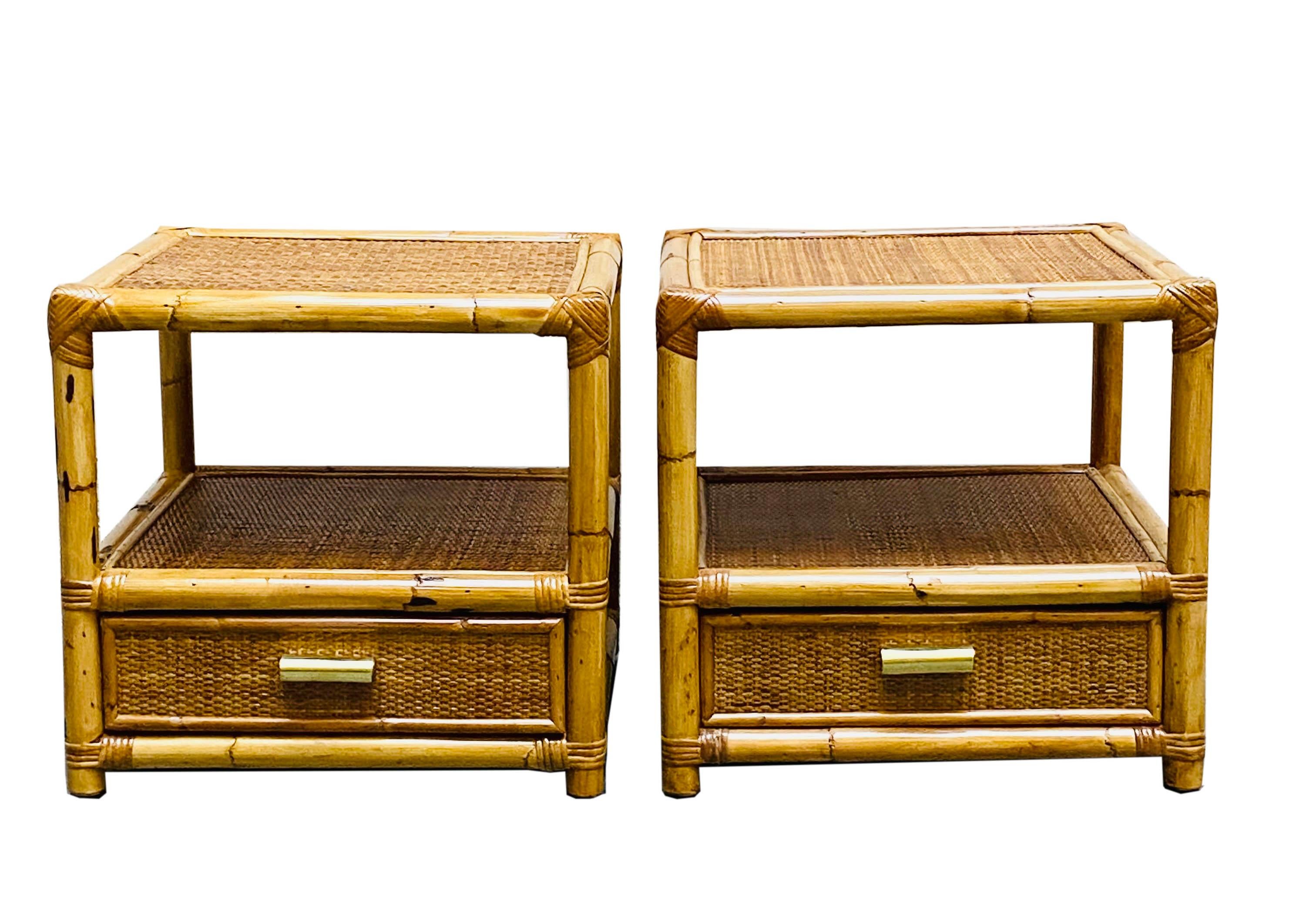 Beautiful pair of 1960s Italian bamboo and rattan bedside tables with brass handles and a drawer. The organic beauty of the woven materials is timeless and classic, making the bamboo and rattan furniture incredibly versatile. Italian Manufactory