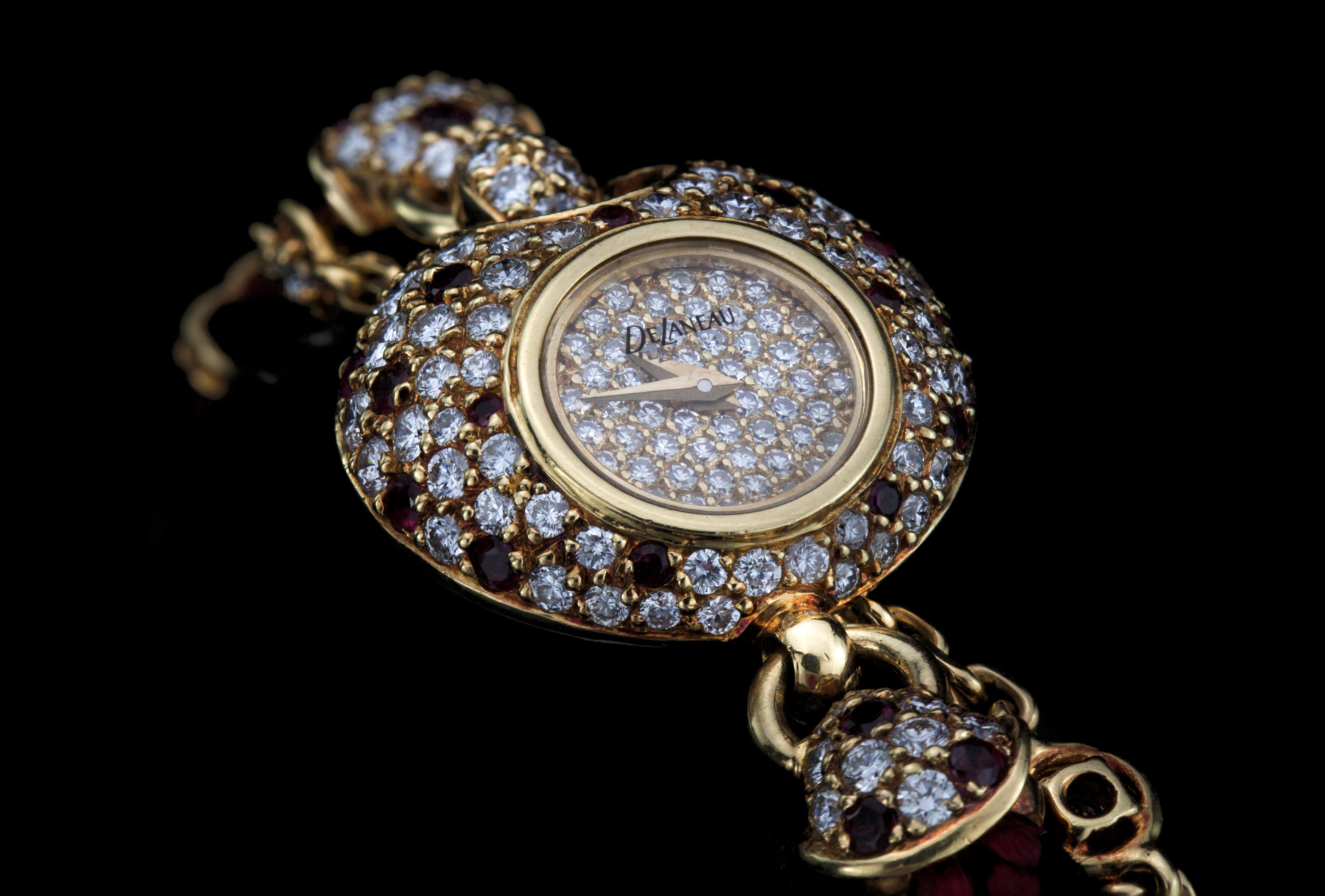 Round Cut Dalaneau 18 Karat Gold Ladies Bracelet Watch with Diamonds and Rubies, 1980s