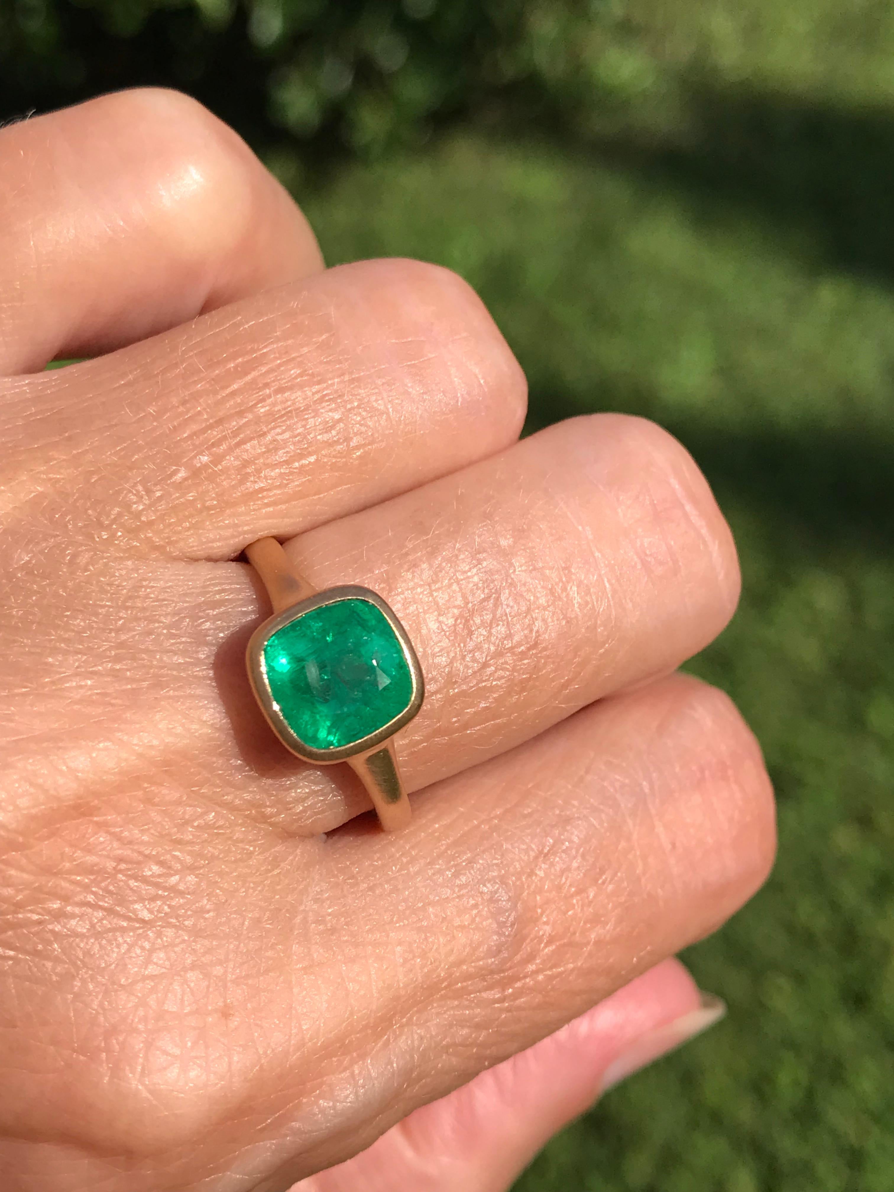 Dalben design One of a Kind 18k yellow gold matte finishing ring with a 2,84 carat bezel-set cushion cut emerald. 
Ring size 7 1/4 USA - EU 55 re-sizable to most finger sizes. 
Bezel stone dimensions :
width 9,7 mm
height 9,4 mm
The ring has been