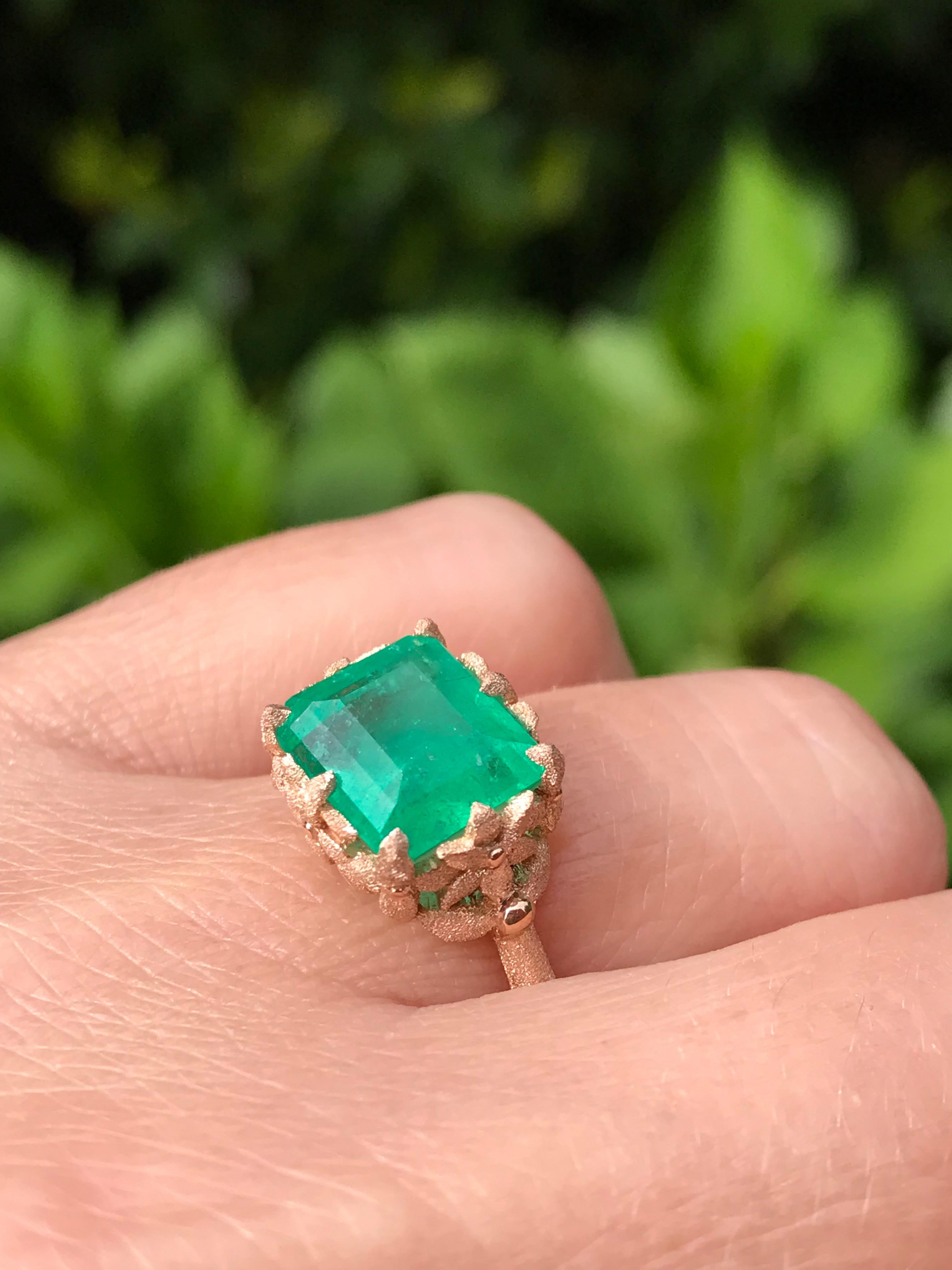 Dalben design 18 kt hand engraved rose gold leaf motif Cocktail Ring with a 3,57 carat emerald cut  emerald. 
Ring size6 1/4 USA , 52 + EU  re-sizable to most finger sizes. 
Bezel stone dimensions :
width 12,1 mm
height 10,7 mm
The ring has been