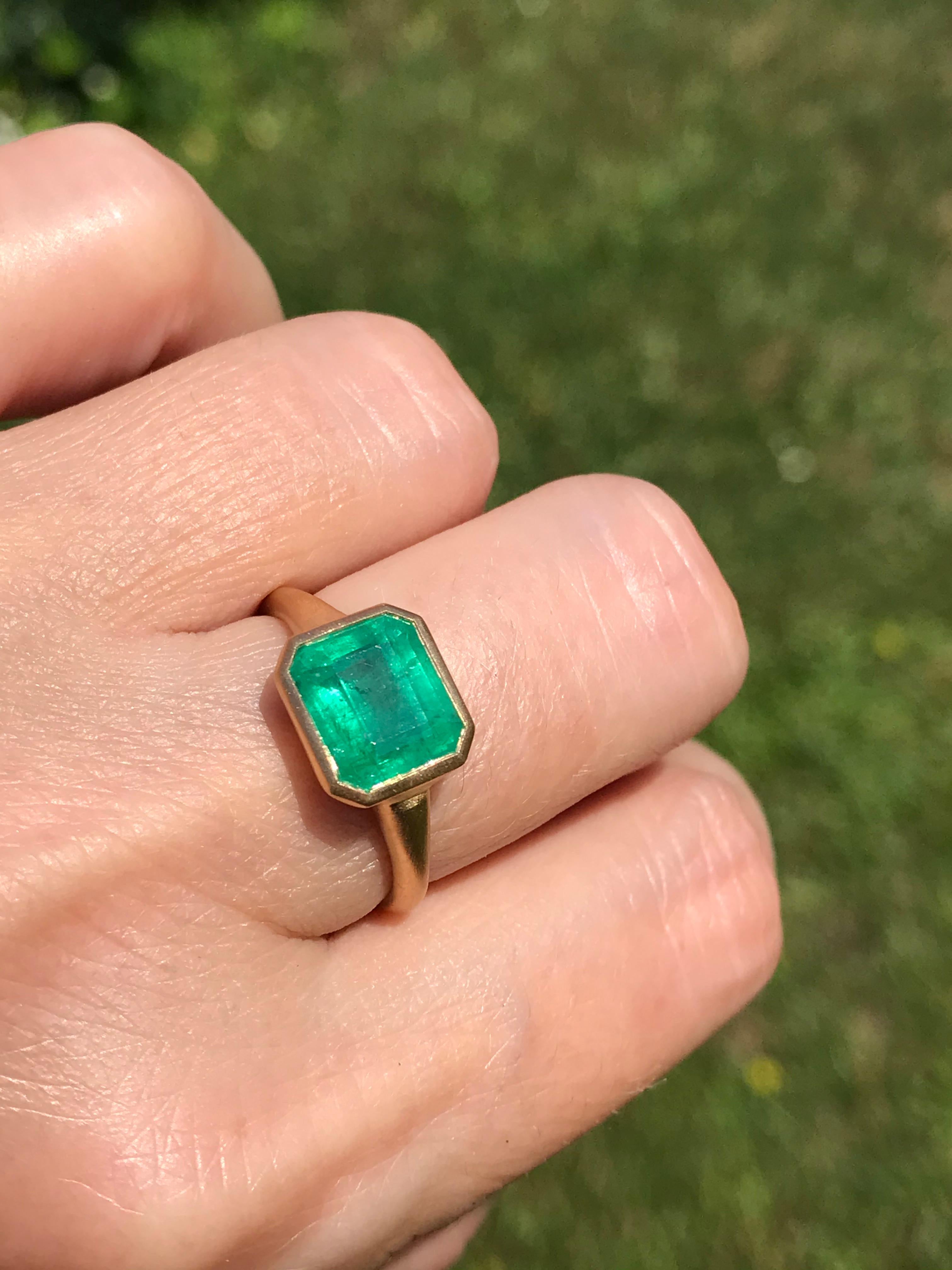 Dalben design One of a Kind 18k yellow gold matte finishing ring with a 3,86 carat bezel-set emerald cut emerald. 
Ring size 7 1/4 USA - EU 55 re-sizable to most finger sizes. 
Bezel stone dimensions :
width 10,6 mm
height 9,1 mm
The ring has been