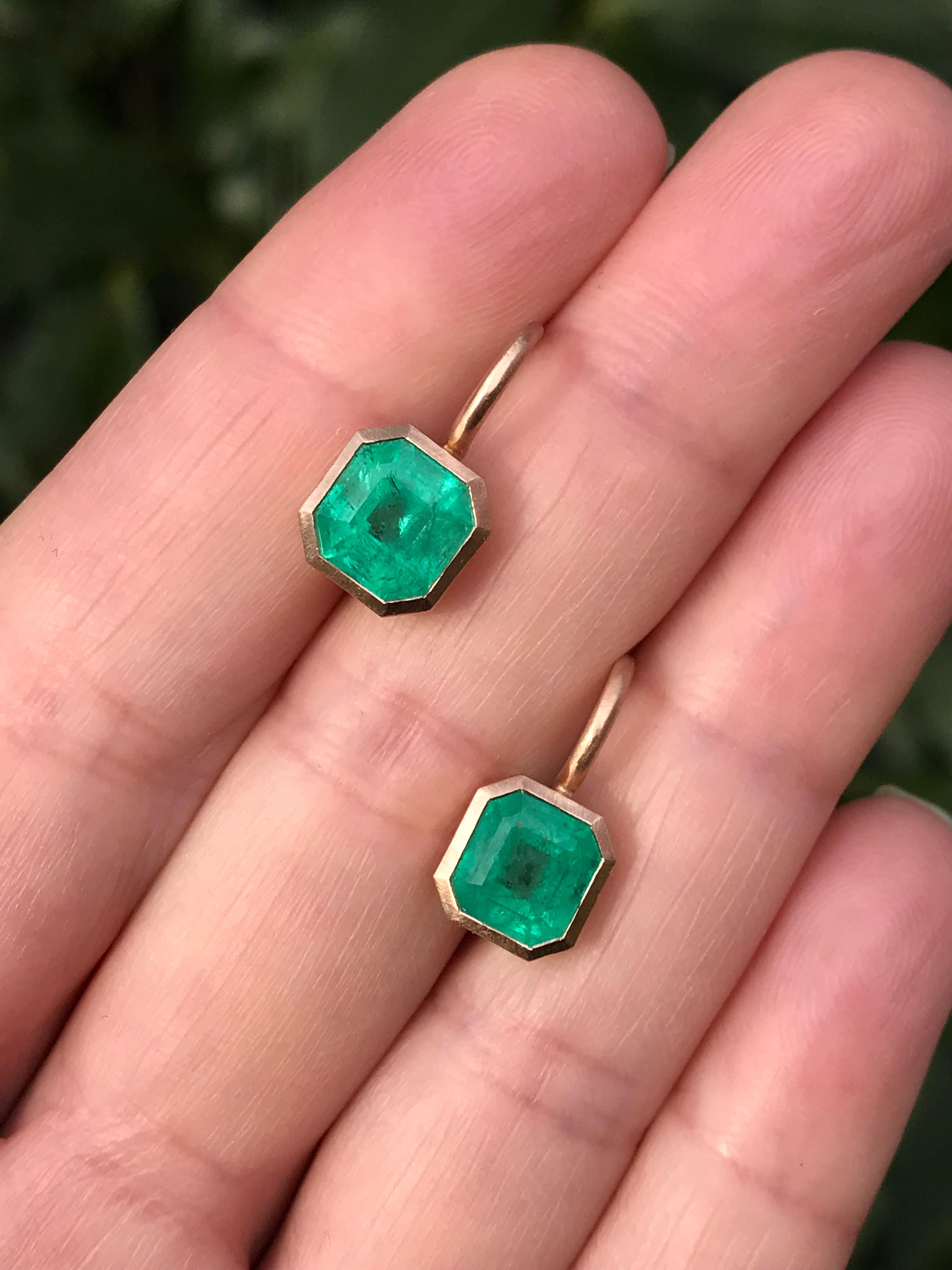 Dalben design  18k rose gold matte finishing earrings with two bezel-set emerald faceted cut  Colombian emerald weight 4,03 carats .
They are not a perfect pair ,  
Bezel stone dimensions :
 8,6 x 8,2 mm   8,9 x 8,6 mm
height with leverback 17