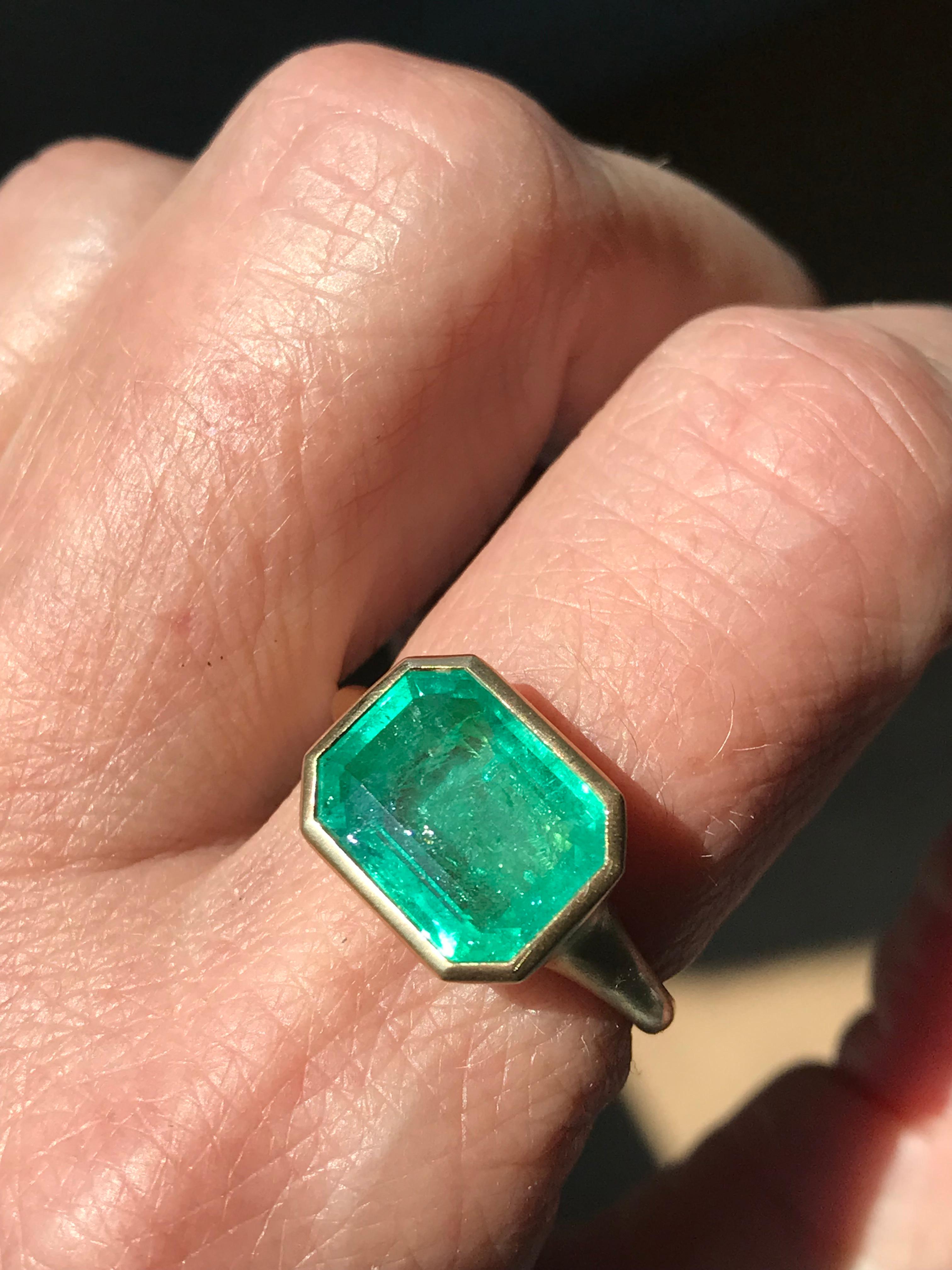 Dalben design One of a Kind 18k yellow gold satin finishing ring with a 4,3 carat bezel-set emerald cut emerald. 
Ring size 6 3/4  USA - EU 53 re-sizable to most finger sizes. 
Bezel stone dimensions :
width 13 mm
height 10,3 mm
The ring has been