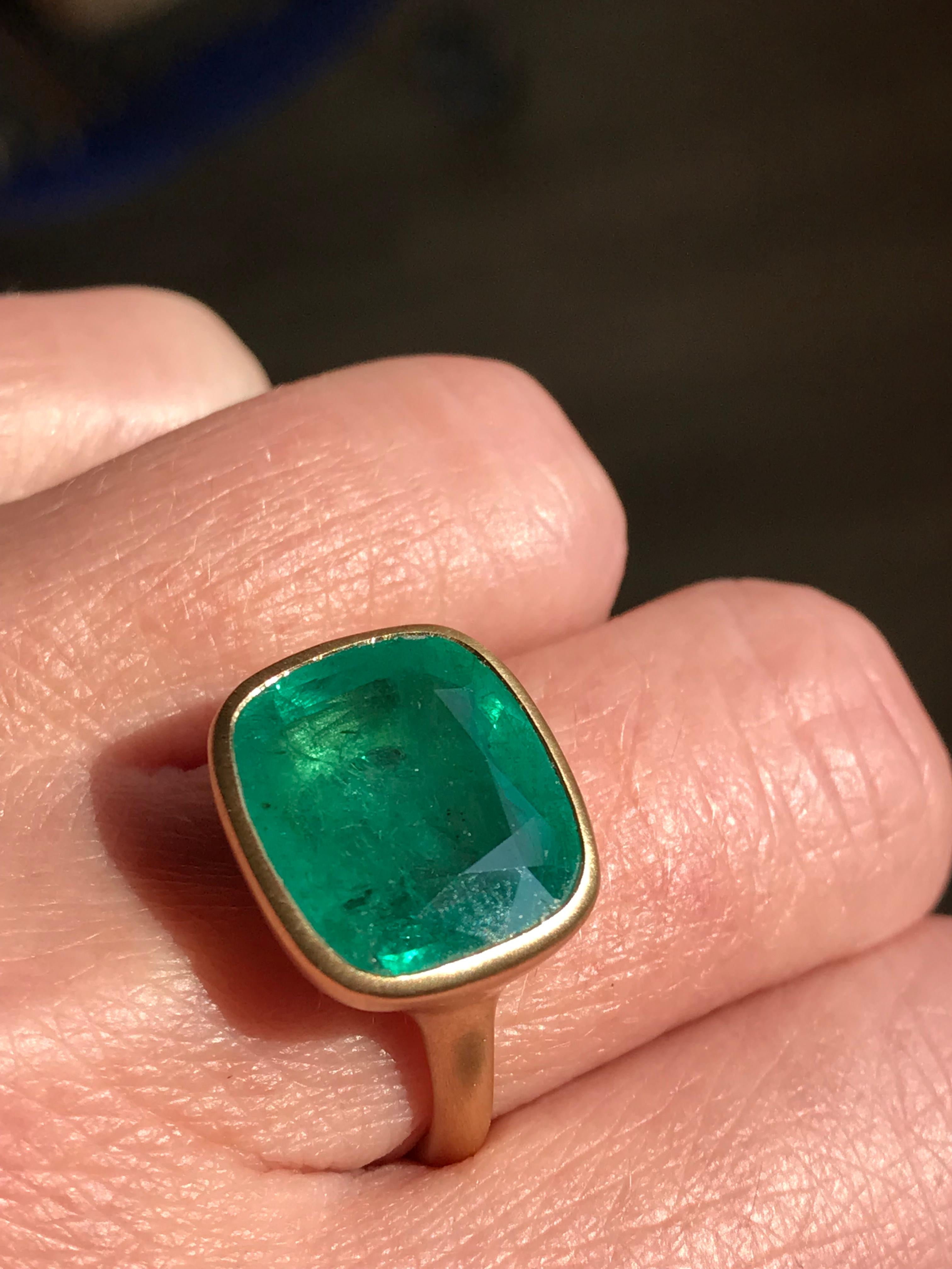 Dalben design One of a Kind 18k yellow gold satin finishing ring with a 9,7 carat bezel-set cushion cut emerald. 
The emerald have natural visible inclusions .
Ring size 7  USA - EU 54 1/2 re-sizable to most finger sizes. 
Bezel stone dimensions