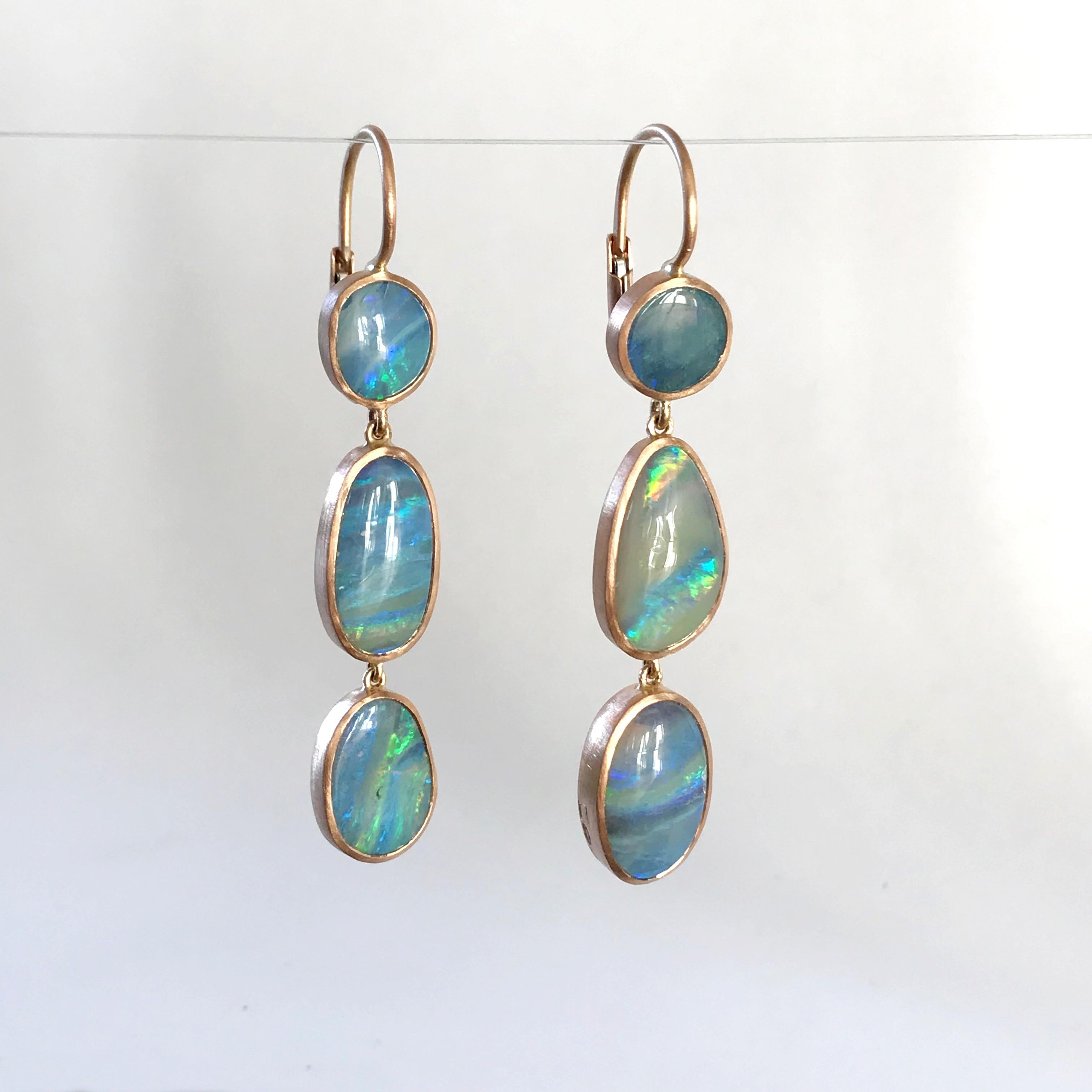 Dalben design One of a kind 18k rose gold matte finishing dangle earrings with six light blue- green bezel set Australian Boulder Opals weighing 12,55 carats.  
max width 9,2 mm 
height without leverback 40 mm
height with leverback 48 mm  
The